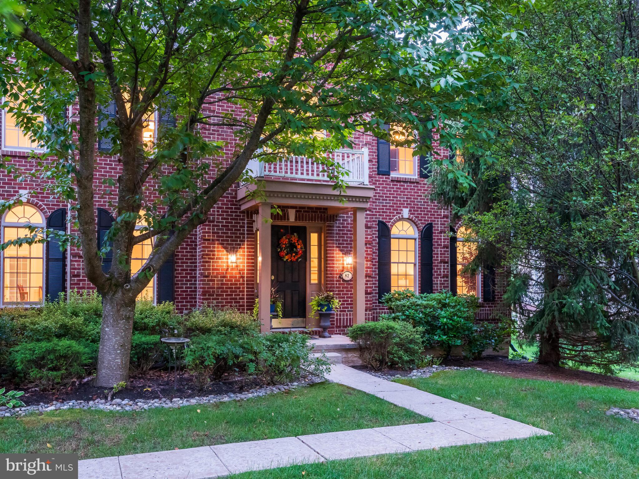Welcome to 82 Goldfinch Circle, nestled in the prestigious "Masters" section of Rivercrest. This home, located within a gated golf-course community, showcases the pinnacle of luxury living. As you step through the front door, you'll immediately be captivated by the dramatic dual curved staircase, 10-foot ceilings on the main level, coupled with elegant custom millwork and crown molding throughout. The large, open kitchen is a chef’s dream, adorned with sleek granite countertops, top-of-the-line stainless steel appliances, and cherry custom cabinetry. The space is further enhanced by a large pantry and a secondary staircase leading to the upper level. There is a large mud room and laundry room off of the kitchen area and the three-car garage. Adjacent to the kitchen, the two-story family room has a brick, wood burning fireplace, dramatically flanked by a wall of windows that frame views of the private backyard. The large office is right next to the family room and half bath. The luxury extends beyond the main living areas. Upstairs the primary suite features a sitting area perfect for unwinding with a book, two expansive walk-in closets, and a large bathroom. Indulge in the upgraded large soaking tub, and a newly installed frameless glass-enclosed stall shower. There are two separate, private water closets. Each of the additional three bedrooms boasts their own en-suite bathrooms and generous walk-in closet spaces. Step outside, and you'll find your own private oasis—a two-tiered, large composite deck that runs the width of the back of the home, perfect for enjoying peaceful evenings or hosting lively gatherings. Living at 82 Goldfinch Circle means more than just owning a beautiful home; it’s about embracing a lifestyle. Take advantage of the community’s amenities, including a private golf course, a community clubhouse with a full gym and a private clubhouse with dining prepared by award-winning chefs, a fireside lounge, a full gym, beautiful locker rooms, and two separate swimming pools – one included in the monthly HOA fee and the other with a private membership. This pristine home, within walking distance to the country club, is the perfect blend of luxury and convenience. Don’t miss this rare opportunity to own a home where every detail has been thoughtfully crafted for comfort and elegance. Within just a few miles from Rte. 422, Route 202, Wegmans, restaurants, shopping and just five miles from downtown Phoenixville. Welcome home…