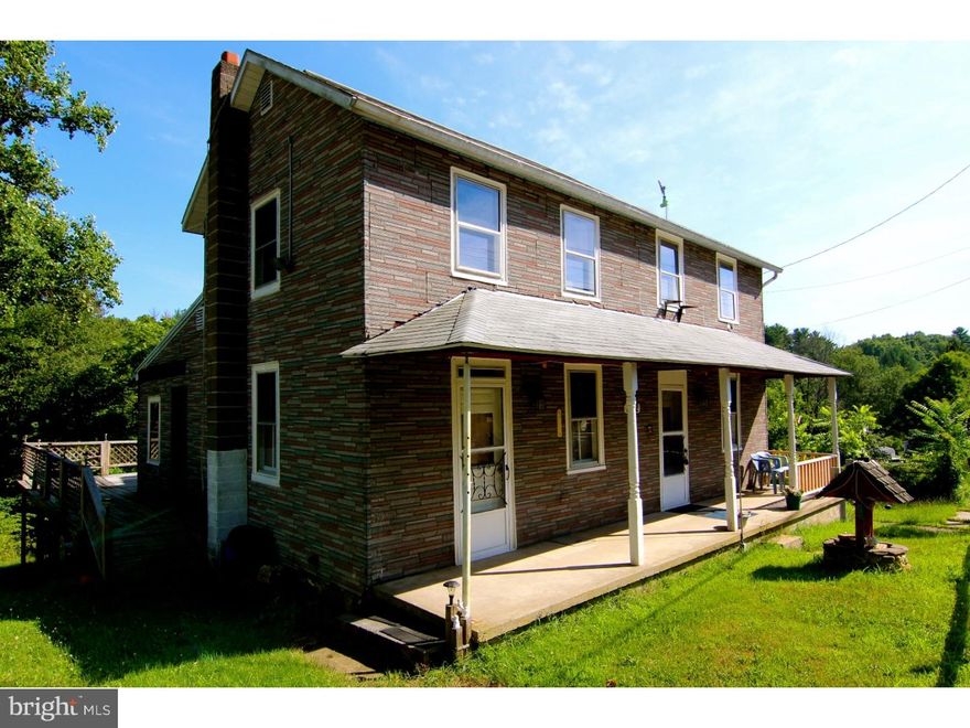 Single 3BR/1.5BA home in private country setting in Cass Township. Situated on close to one full acre, this spacious home has a large living room that opens to an eat-in kitchen; bonus family room with bar area, perfect for entertaining; first floor laundry room and full bath. Second floor is accessed by a dual staircase and offers three nicely sized bedrooms. Walk-up attic and full basement provides ample storage. Enjoy the country side views from the rear deck which extends the full length of the house. Economical coal heat, newer roof (2010) and water heater (2012).