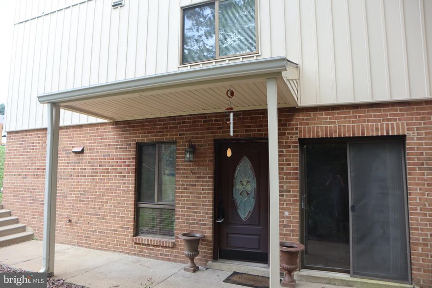 PERFECT HOME for first time home buyer OR investor. Property is updated and offers two spacious bedrooms and two full bathrooms accented with exposed brick walls.The open kitchen of this property boasts NEW cabinets and countertops complemented with stainless steel appliances. This lovely home also features a new washer and dryer unit as well as an updated bathroom.  Lots of closet space in this condo and  has two parking spots! Great location close to Town Center, and VRE. Association includes swimming pool, tennis courts and more! Don't Miss!