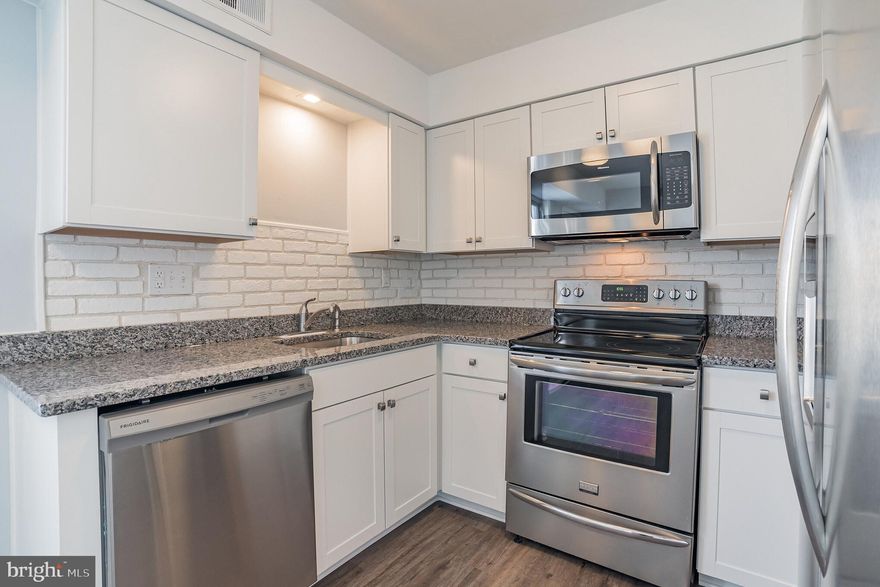 Completely remodeled 3 bedroom, 1 full bathroom townhome in desirable Neshaminy Valley section of Bensalem Township.   As you enter the home, hang up your coat and place your shoes in the closet and get ready to unwind in the large living room with vaulted ceiling.   There is new recessed lighting and a brand new ceiling fan with light.    There are all new laminated floors in the living room and dining that take you into the completely new eat-in kitchen.   As you walk into the kitchen you pass a pantry closet and will take in the modern look of the all new cabinets.  There are also beautiful new granite counter-tops, stainless steel appliances including side-by-side refrigerator/freezer, built-in oven with cook top, overhead built-in microwave and dishwasher.   To the side of the kitchen is the utility area with newer heater and the hot water heater along with the closet with side by side, full size washer & dryer.   Off the back of the kitchen you will exit to the rear yard with large storage shed, new rear vinyl siding along with exterior light and access to a breezeway for convenience.    Continuing through the house, and walking down the hallway you will find a linen closet, 3 bedrooms each with large closets and new ceiling fans with lights and all new carpeting throughout the area.  There is a very nice, newly redone 3 piece ceramic tiled bathroom with new, large vanity, sink and toilet along with new lighting fixture.  There is a new, pull down stairs to a huge, walk-up attic for plenty of storage.  The property features newer roof, HVAC system and front and rear storm doors.   This property is truly turn key and ready for the new buyer to move their furniture in and enjoy!