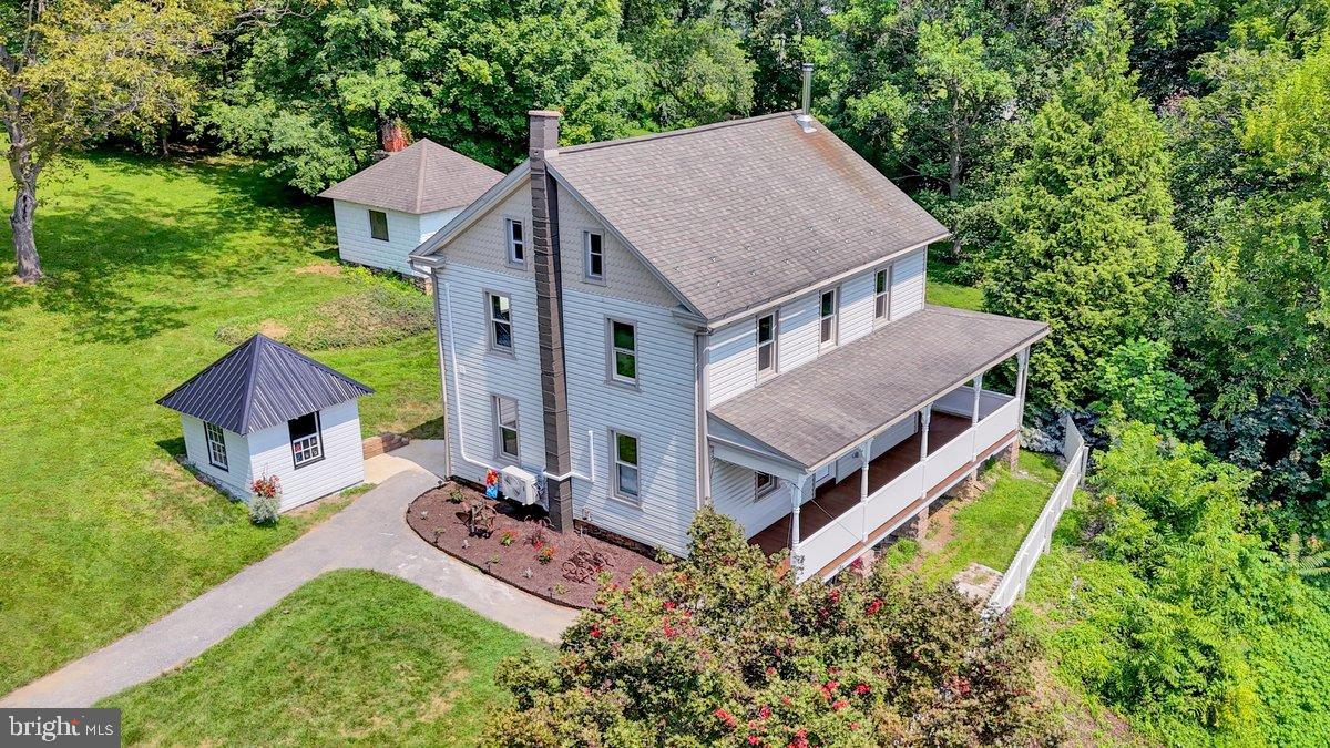 Welcome to this beautifully renovated 3-bedroom, 2-bath traditional farmhouse nestled on nearly 2 acres in the heart of southern Lancaster County. Enjoy peaceful, panoramic views of the surrounding countryside while being just minutes from Lancaster City, the Susquehanna River, local boat clubs, hiking trails, and more. Also, including this property is a first floor, master suite and a bonus office space or nursery off of one of the second floor bedrooms.
Step inside to find a thoughtfully updated interior that blends classic charm with modern comfort. Whether you’re sipping your morning coffee on the expansive front porch or entertaining in the inviting living spaces, this home offers the perfect balance of tranquility and convenience.
The property also includes a 1,500 sq. ft. pole building currently rented at $900/month, providing immediate income potential. The tenants are open to vacating, offering flexibility for those looking to use the space for personal or business needs.
Don’t miss this rare opportunity to own a move-in ready farmhouse with acreage, scenic views, and income-generating possibilities—all in a highly desirable location.