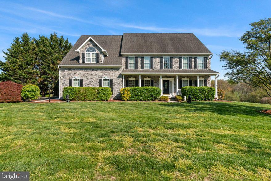 Experience **estate-style living** in one of Forest Hill’s most desirable communities—Valley’s at Howard’s Chance. Set on a **rare 1.16-acre flat homesite**, this exceptional residence offers over **5,400 square feet of finished living space**, combining space, privacy, and functionality in a way that is rarely available in this market.

From the moment you arrive, the home makes a lasting impression with its **stately stone front, expansive driveway, and inviting front porch**. Inside, a dramatic **two-story great room filled with natural light** anchors the main level, complemented by **dual staircases** and a layout designed for both everyday living and seamless entertaining.

The **gourmet kitchen** serves as the heart of the home, featuring a **custom marble table that conveys**, ideal for gatherings and daily use. A convenient **main-level laundry room** is located just off the garage entry.

Upstairs, you’ll find **four spacious bedrooms and three full baths**, including a **luxurious primary suite** with a private sitting area, **dual walk-in closets**, and a **spa-inspired bath** with soaking tub, separate shower, and dual vanities.

The **fully finished walk-out lower level** adds approximately **1,250 square feet** of versatile living space, complete with a **second kitchen, full bath, and new luxury vinyl plank flooring**—perfect for guests, extended family, or multi-generational living.

Outdoor living is where this property truly shines. Designed for year-round enjoyment, the backyard features a **spacious deck with built-in grill (gas and water hookups), custom stone walkway, firepit gathering area**, and a **large shed with electric and water**—creating a private, estate-like setting ideal for entertaining or relaxing.

Additional upgrades include a **whole-house generator, dual-zone HVAC (2024), water treatment system (2021), new hot water heater and well tank, whole-home audio system, and motorized blinds**.

This is a **rare opportunity to own a luxury home with space, flexibility, and true indoor-outdoor living**—all in a prime Forest Hill location.