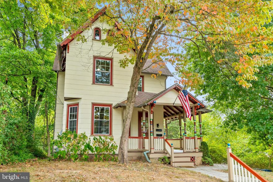 130 Tennis Avenue, a fabulous turn-of-the century Victorian-style home in Ambler Borough, exudes charm and craftsmanship and offers an amazing opportunity for the savvy homebuyer.  Choose to keep the current duplex zoning in place and offset your mortgage with a tenant or easily restore the home to a 5 bedroom, 3 bath, single family dwelling. New owners have the option to choose the floorplan that best suits their needs without compromising the details that contribute to the home’s charm and character. Upon approaching, you are greeted by a cozy covered  front porch that offers a welcoming entrance and is the perfect spot to relax after a long day. Inside, you will find a classic vestibule that provides the ideal location for hanging coats, storing shoes and backpacks, or dropping your keys and mail. Two easily removable walls in the foyer currently separate the dwellings. The first unit consists of the main level and finished basement. The main level features 3 nicely sized adjoining rooms that flow seamlessly together from the front to back of the house and boast high ceilings, tasteful original wood floors, and an abundance of natural light afforded by oversized windows and french doors. The living room features a wall-mounted bioethanol fireplace that burns clean and produces minimal mess. You will be pleasantly surprised to see the remodeled kitchen with white cabinetry, a double sink, glass tile backsplash, and a charming over-the-sink bay window, as well as an adjacent full bathroom. Both the kitchen and dining room provide access to a spacious back deck overlooking 2 large paver patios, established plantings, and a small ornamental pond. Downstairs, the finished walk-out basement, offers approximately 700 additional square feet of living space and features an eye-catching stone wall, a second bioethanol fireplace, a spacious full bathroom, and laundry area. Enter the second unit via the stunning wooden staircase off the foyer and you’ll quickly see that the original  hardwood floors and abundant light continue throughout both the second and third floors. The second floor currently offers 2 nicely sized rooms separated by antique glass-panel doors, a large walk-in closet, spacious full bathroom with a stackable washer and dryer, and a tastefully renovated kitchen. The third floor features 2 additional rooms and a large storage closet. The second and third floors are heated by hydronic baseboard heaters which are more efficient than traditional electric baseboard heat since the hot water continues to emit heat long after the heater is turned off.  There is plenty of room outside to enjoy the outdoors, gather around a firepit, and entertain friends and family. And, if you happen to be looking for a large workspace for hobbies, room to store tools and equipment, or another potential income stream, you will love the detached 2- car garage with a workshop area and overhead storage. Beyond the garage is Ambler Borough Park and access to a park trail that leads along the Rose Valley Creek and over a bridge into the dog friendly main park.  In addition to the 2 garage bays, the driveway offers additional parking for 4 cars and room to turn your cars around before exiting.  Other noteworthy features not to be overlooked include new windows and doors that come with a lifetime warranty, sewer lateral replacement, new chimney flue rated for a wood burning stove, and a seller provided 1-year home warranty.  This terrific home is located in the award-winning Wissahickon School District, conveniently located nearby many major routes of transportation and the Regional Rail and just blocks from downtown Ambler and all that this great town has to offer: fabulous restaurants and breweries, great shops and boutiques, a movie theater, comedy theater, and playhouse, newly renovated library, seasonal farmers’ market, numerous festivals, and a co-op grocery store.  Don’t miss out on this fabulous opportunity - schedule a tour today!