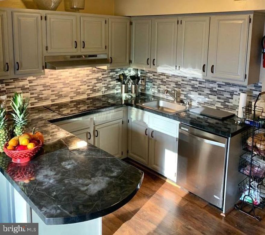 Gorgeous townhome near Quarry Lake! Plenty of living space including a finished walk out basement with plenty of room to entertain! Beautiful kitchen on main floor with built in appliances and large dining area. The home features another dining room that opens up to the large family room featuring a fireplace and walk out to a fantastic deck! Lovely half bath on main floor. The top floor features 3 large bedrooms and 2 full baths.  Huge storage room on lower level and lots of closet space throughout! There is plenty of living space in this spectacular home! Summit Park Elementary and close to many wonderful dining options! Only a short drive down I-83 to get to inner harbor, Camden Yards and so much more! Near Beautiful Quarry Lake & Mount Pleasant Golf Course. Major commuter routes include I-95, I-83, and I-695. Available January 1st!  Come see this spectacular townhome today!   Like what you see? Want to live in this beautiful home? Fill out this application! https://apply.link/3kduj3u