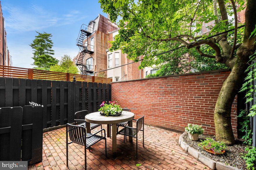 Tucked away on a  quiet tree lined street in the Heart of Fitler Square, is this beautiful renovated, 3 bedroom,2.5 bath home including a rare attached one car GARAGE equipped with 220 V service and an EV-Charger.  Enter into the first  floor foyer that provides ample storage, powder room and laundry room.   The back room features a spacious family room with a cozy fireplace and direct access to a private patio perfect for outdoor dining, gardening or relaxing.  The second and third floors boast of beautiful hardwood floors throughout.  The main living area includes a bright dining space that opens onto a lovely balcony with outdoor heater;  where you can enjoy views of a gorgeous magnolia tree that provides natural shade and a stunning seasonal backdrop.  The updated kitchen also flows directly to the balcony, creating a seamless indoor-outdoor connection ideal for entertaining or quiet mornings.  The living room showcases floor to ceiling Bookshelves that add character and functionality.  In addition there is a new Walnut Cabinet/bar wonderful for entertaining.  

The third level of the home features three spacious bedrooms with plenty of closet space and full bathroom and linen closet off of the hallway.  The Master bedroom completes the floor with tons of natural light, custom floor to ceiling built-in wardrobes, and fantastic en-suite bathroom.  Other notable features are:  (Private Street) designated by the Parking Authority which allows you to park in front of your garage.   New Custom Security Gate and front entrance with marble tile, completely renovated backyard with new brick wall and electric charging station in the garage.  This home has a marvelous location - just 1/2 block from Fitler Square, close to Schuylkill River Park, Schuylkill River Trail, and the dog park.  Located in the sought-after Greenfield School catchment; local restaurants, cafes, tennis courts and Public Transportation. Short commute to University of Penn, CHOP, Drexel University and Amtrak's 30th Street Station.  Such a marvelous location with Parking PLUS - This home offers the perfect blend of Comfort, Charm and Location   A MUST SEE!!!