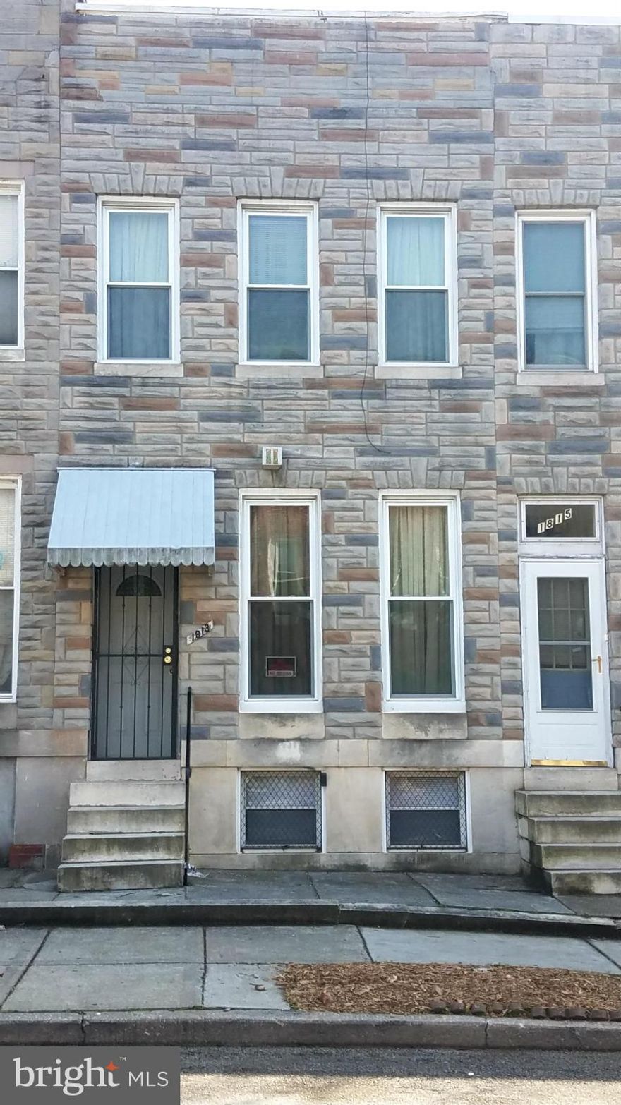 Delectable 3 Bedroom 1.5 Bath row house with lots of character. Ample space in bedrooms and basement.