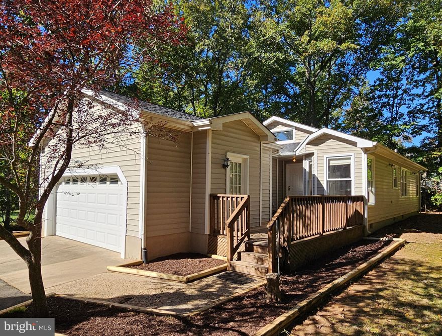 3 BR, 2 BA rancher with attached garage, nestled on a private wooded lot in Lake Wilderness.  This home features an eat-in kitchen, dining room open to family room, hardwood and carpeted floors, MBR with private BA, gas fireplace, and rear patio.  Community amenities include pool, club house, tennis, basketball, beach, non-motorized boating, fishing, playgrounds, and more.  Lake Wilderness offers the best of both worlds, surrounded by historical and natural areas and trails but convenient to Fredericksburg for shopping, entertainment, and services.