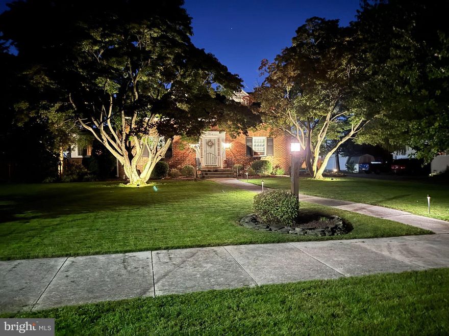 Don’t miss the opportunity to own a meticulously maintained Cape Cod home on a generous ½ acre in historic Hanover. Nestled on one of the area’s best blocks, this property is just a short stroll from the Eichelberger Performing Arts Center, allowing you to enjoy a variety of shows without the hassle of traffic or parking. Plus, you’ll be within walking distance of Historic Downtown, which features delightful restaurants, four breweries, and unique shops.
This charming home offers two bedrooms and a full bathroom upstairs, along with a main floor master bedroom and convenient half bath. Enjoy the eat-in kitchen, a separate dining room, and a large living room complete with a working wood fireplace. The attached sunroom is perfect for an office or cozy sitting area. The home is equipped with natural gas heating, city water, and sewer.
Recent updates include a beautifully renovated kitchen with granite countertops, freshly painted cabinets, and new appliances, including a sink, faucet, and garbage disposal. You’ll find newly refinished hardwood floors throughout, along with new carpeting and windows in the sunroom. All doors leading from the kitchen, sunroom, and basement have been replaced, and the basement has been fully waterproofed with two new sump pumps. Additional upgrades include a new roof, gutters, furnace, and outdoor AC unit.
Step outside to discover your own personal paradise. Off the breezeway, a hand-painted herringbone stamped concrete patio features a five-person hot tub overlooking a serene koi pond with a tranquil two-tiered waterfall. Follow the new stamped concrete walkway to the swimming pool, complete with a new liner and pump, and enjoy the newly renovated composite deck.
At the back of the yard, a private outdoor living area awaits, equipped with two 42,000 BTU radiant propane heaters, full electrical access, and two ceiling fans. A Wi-Fi-enabled (Roku)flat-screen TV makes it perfect for movie nights or watching your favorite sports.
The property includes an attached two-car garage and a detached 30x50 garage with two 10-foot doors, ideal for mechanics or DIY enthusiasts. This heated and air-conditioned garage features a 9,000-pound car lift and a full bathroom with a shower—perfect for post-pool changing or relaxing in the outdoor space. Above the garage, a spacious loft offers potential as an apartment, office or storage area.