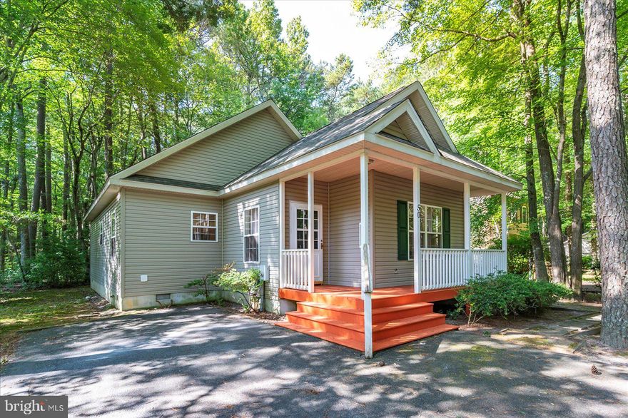 This 3 bedroom, 2 bath home has a second floor bonus room that could easily function as a forth bedroom.  Larger than indicated in the public record, this home offers a bit more than 1400 sq/ft of finished living area.  The large, high ceiling, family area has a gas fireplace and room for everyone.  This property will make a great beach getaway or family home.  Spend your days on the beach in Ocean City at the exclusive Ocean Pines Beach Club or at one of the Ocean Pines pools and then relax on the inviting front deck or the more private large screened porch.  The interior of the home has been recently painted and new flooring has been installed throughout.  Ideally located near the south gate, this property is a short drive to dining, shopping, the Ocean Pines Yacht Club and pool, and the south gate indoor pool.  Don't wait.  This property is priced to move and could be yours.  Welcome to the beach!!!