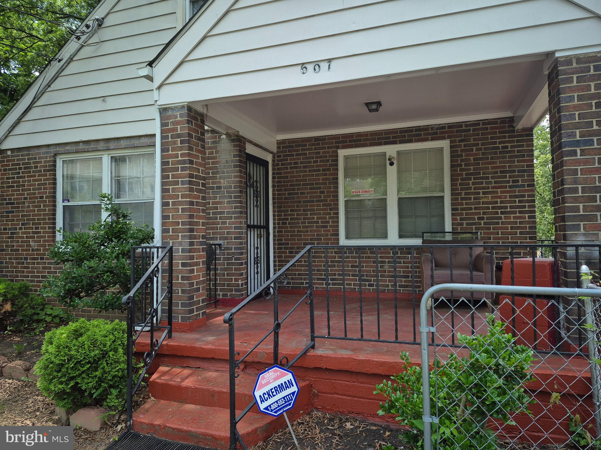 Nostalgic front porch. Big secured parking space in side yard and rear yard. Basement has a bomb shelter! Home needs TLC.
