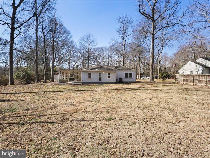 Detached 1 BR/1 BA  property with Carport for the price of an apartment in sought after Hybla Valley Farms! This rare on the market single level rancher includes all living space on one level to include the kitchen, living room, bedroom, full bathroom and laundry room that includes space for storage. The home resides on a completely flat 1/2 acre lot, mostly in the back yard for ample privacy. Home is located right off of Route 1, providing a quick commute into DC, Old Town or West to Tysons and is nearby many retail locations including Target, Walmart, Grocery Stores, Coffee Shops and many Restaurants to conveniently choose from. Property will be fully painted before the next tenant moves in and will be available on March 1st, 2025.  Do not miss this very unique opportunity to have a lot of privacy and space at this price point!
