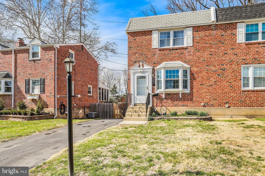 Welcome to 317 E Rodgers, a 3 bedroom, 1.5 bathroom twin home that’s walkable to everything Ridley Park borough and township has to offer. Enter into the living room with plush wall to wall carpeting and three panel bay window that drenches the space in natural light. The main floor flows nicely into the spacious dining area that has a powder room and access to the rec room basement. The updated eat-in kitchen is thoughtfully designed to include tons of custom oak cabinets with crown molding, a desk area, recessed lights and features stainless steel appliances and access to the back porch that has been converted into a den with brick wall facade overlooking the extra large/fenced in backyard. Upstairs includes three large bedrooms. The primary bedroom has an oversized closet with space for lots of storage. An updated hall bathroom includes a tub shower with ceramic tile surround. Two additional bedrooms with hardwood floors and a spacious linen closet complete this level. Lastly, the basement offers both additional living space, as well as laundry facilities, storage and a workshop for those who like to tinker. This home offers more than meets the eye on an idyllic tree line street and private driveway. All this while set within Ridley Area School District, close to MacDade Blvd shops and restaurants, ABC baseball fields, Downtown Ridley Park shops and SEPTA’s regional rail Wilmington/Newark line for an easy commute to Philadelphia or Wilmington.