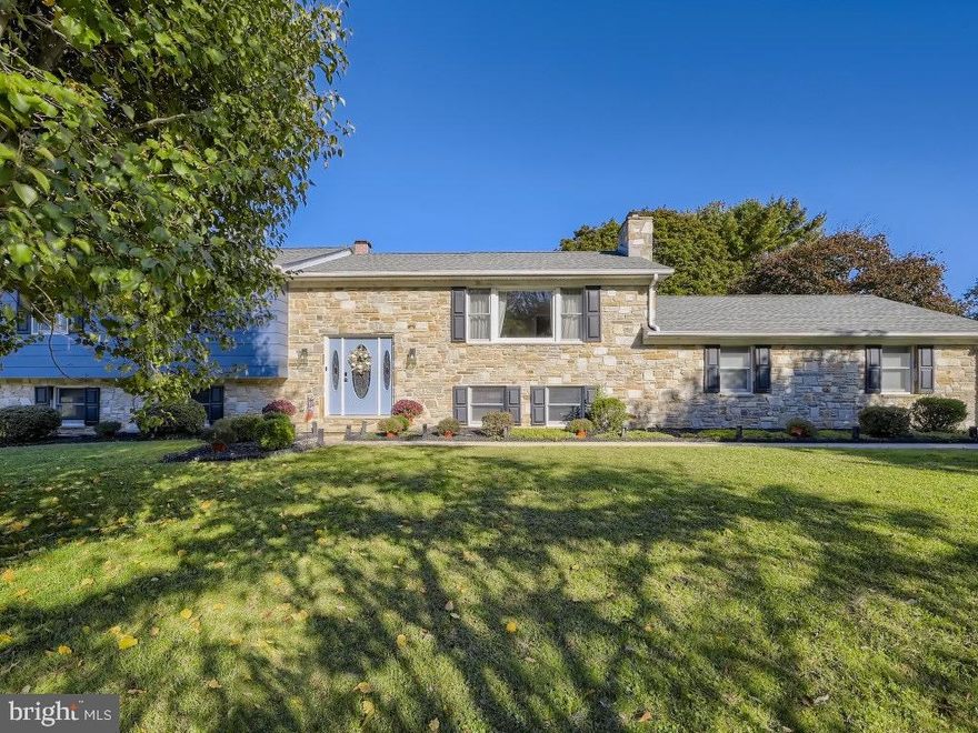 Truly special stone split-foyer home, with over 2800 square feet of living space,  nestled in highly desirable Rolling Green. Open and bright kitchen with corian countertops, stainless steel appliances, and ceramic tile. Enjoy the beautiful view of the park-like backyard from the bay windows. Formal dining room opens to sizable living room with oversized picture window, both feature crown molding and gleaming hardwood flooring. Master bedroom includes 2 large closets and attached bath with ceramic tile. All 4 ample sized bedrooms include refinished hardwood flooring and ceiling fans. Side entry oversized garage. This home has plentiful storage including lower level crawl space and 2 large attics. The expansive and tranquil grounds are beautifully manicured; you will want to spend hours on the two-tier deck  taking in the sound of the trees. Perfect property for entertaining or simply relaxing in your own private retreat. Truly amazing almost 1 acre lot with plenty of privacy. New water heater in 2019, new stainless stain refrigerator and built-in microwave in 2019. New 40+ yr roof in 2016. Updated lighting and finishes throughout. 1 yr home warranty included. Amazing opportunity to save on rising interest rates with the possibility of benefitting from owner's 3.25% assumable mortgage. Great community amenities with access to the neighborhood park, pier and beach on the lake. Community Association is optional with no mandatory HOA fees, it has events and activities during the year. Do not miss out on this one of a kind gem!

Professional Photos coming soon.