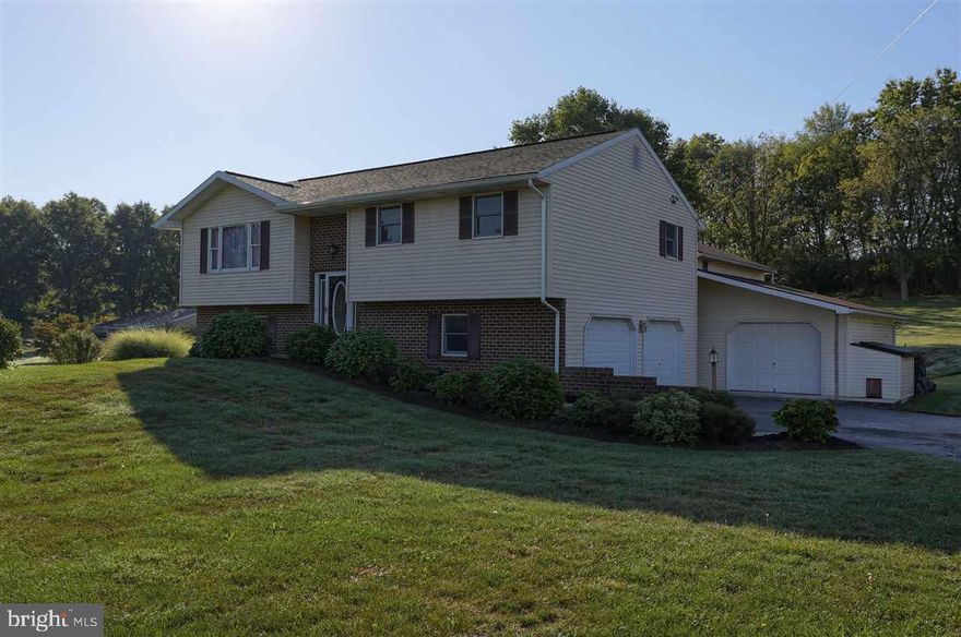 Come check out this 3 bedroom home!  Featuring 2 and a half bathrooms, spacious living room, family room, dining area and laundry room.  This home offers a peaceful setting with an enormous amount of space including a 2+ car garage. There is an in-ground pool and a pool house. Don?t let this home pass you by!