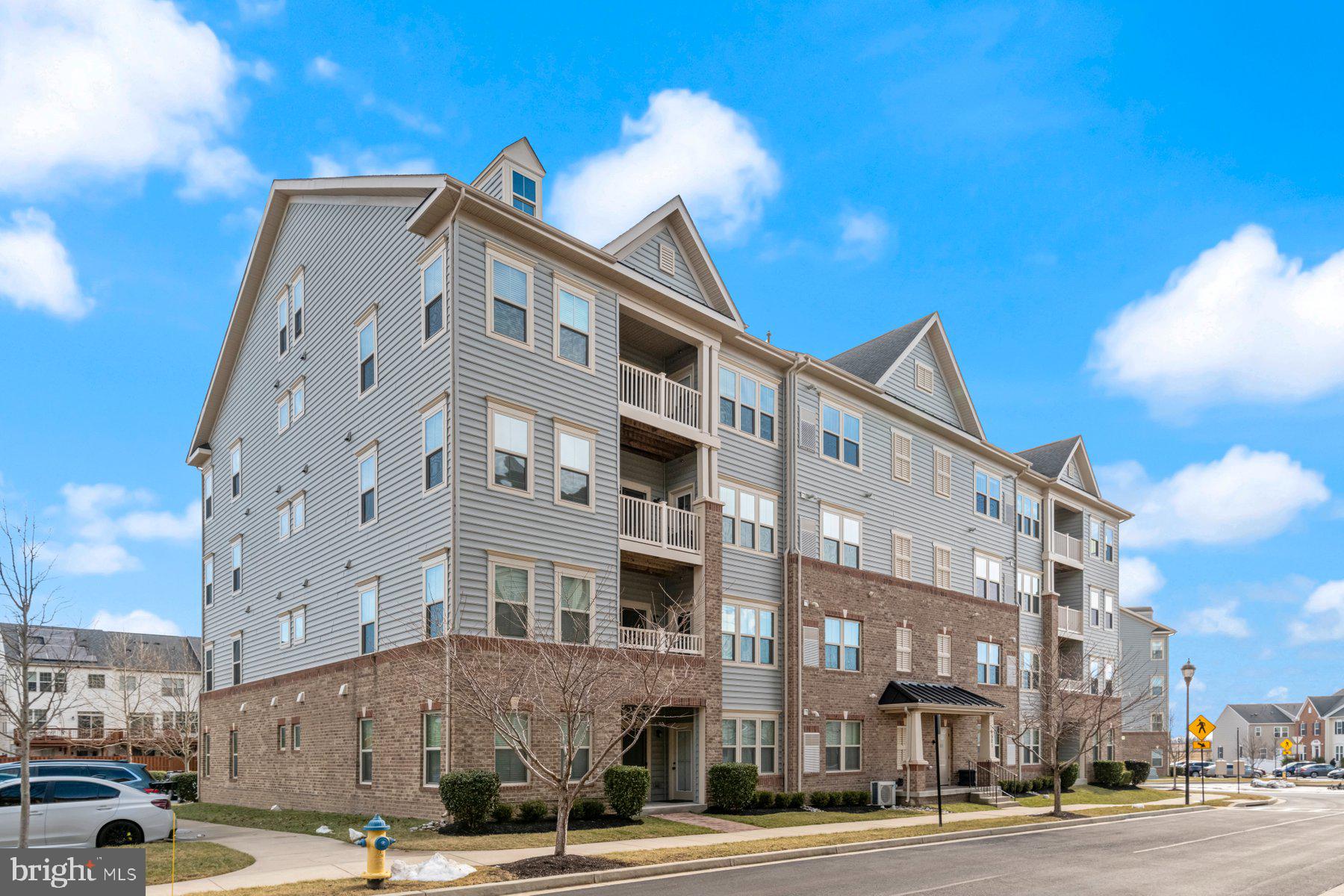 Move-in ready 2BR/2BA Condo located in the desirable community of Linton at Ballenger. Parking is just steps from the front entrance and entry hall with an elevator taking you to the fourth floor and your forever home. Step inside to an open floor plan offering tons of natural light, an oversized living room with a gas fireplace, spacious dining room, and kitchen. The kitchen features cabinets to the ceiling finished with crown moldings, a separate pantry closet, stainless steel appliances, granite countertops, and a double stainless sink set into an island featuring a raised breakfast bar with seating, and open shelving. Off the living room is an area ideal for a home office with access to the cozy balcony that overlooks the neighborhood. The main floor living space features two primary sized bedrooms, the first features a full bath with a walk-in shower and access to laundry. The second boasts a large walk-in closet and private full bath featuring a walk-in shower, and a double sink vanity. The spacious loft is open to the main floor and features a large room ideal as a potential third bedroom, home office or guest room. This home is move-in ready with so much to offer new homeowners and is located in close proximity to shopping, restaurants, and commuter routes.