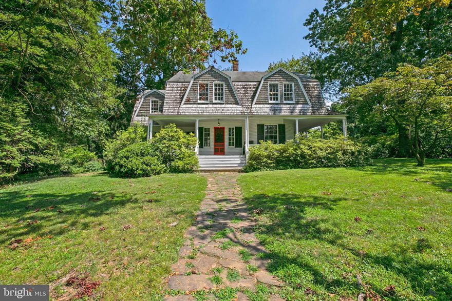 Get away from it all while living just minutes from the conveniences of Reisterstown/Pikesville  in the Frederick Law Olmsted-designed neighborhood of Sudbrook Park. Built in 1891 as a summer home, this Dutch colonial has tall, six-over-six windows, high ceilings, large flowing rooms, and a deep porch on three sides. Home sits on a quiet, private lot (almost 1 acre) with mature landscaping and a pool (AS IS). A true oasis. Large eat-in kitchen (with a removable half wall that could make this room truly expansive) features a gourmet Wolf range. Three working fireplaces (AS IS), and two full bathes including a sunken bath characteristic of historic Sudbrook homes. Wood floors throughout. Second floor has five large bedrooms though one is currently used to create a large master suite with sitting area. Recent upgrades include: furnace replaced in 2020, hot water heater replaced in 2014, new bilco doors on basement.  As part of the historic Sudbrook Park neighborhood this home, which is sold AS IS, is  eligible for historic tax credits.