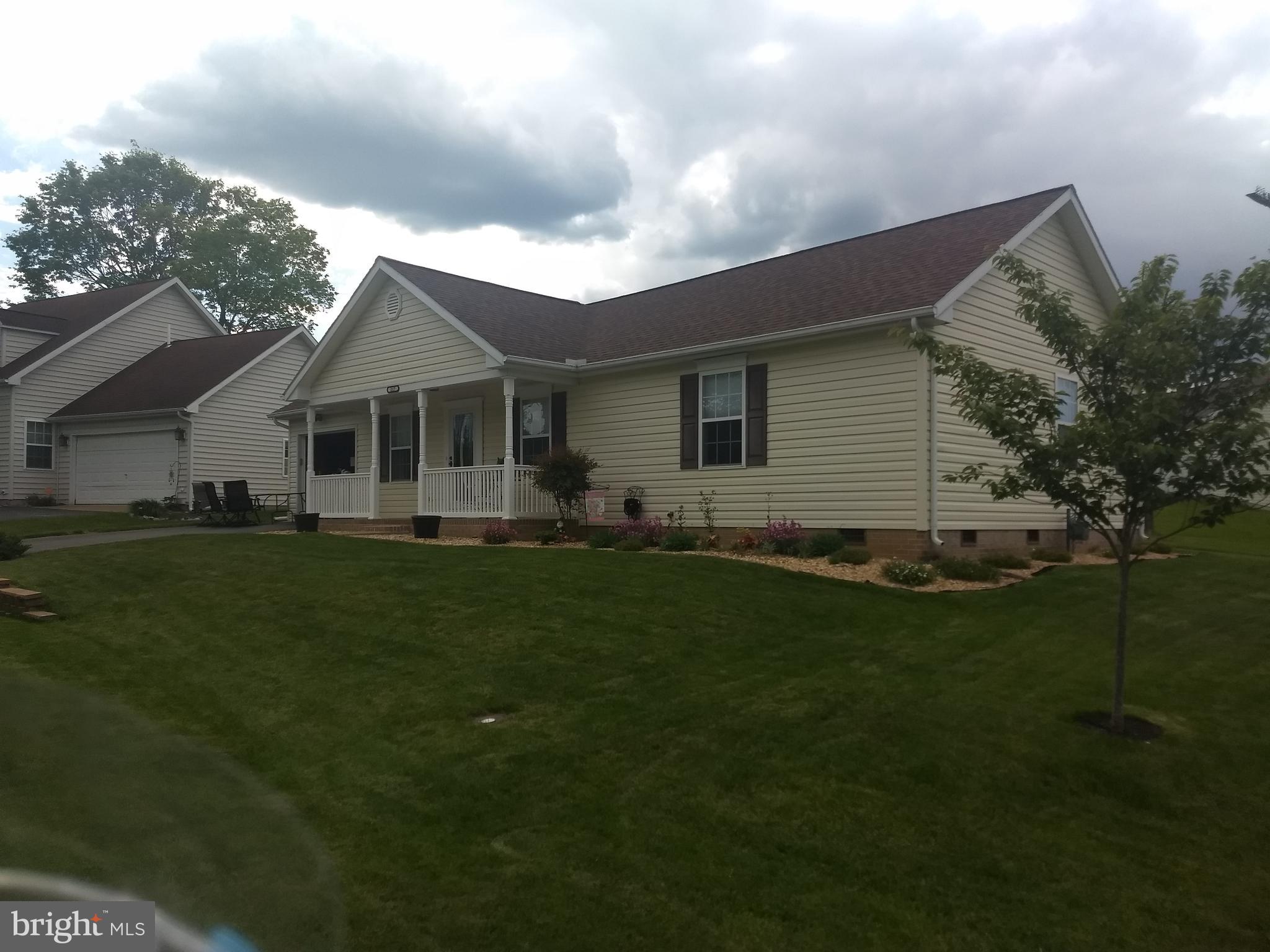 Front porch beauty perfect move in condition.Shows great brand new roof .Great location right by walking path and park to enjoy.Ask about 100 percent loans. awesome park and walking path next door and new roof hvac and siding. showings start SUNDAY 5 16