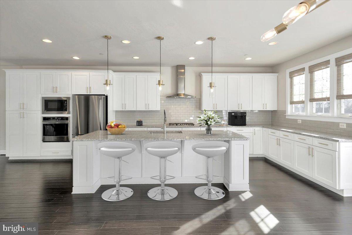 NEW PRICE! OVER 3400 SQUARE FEET. 4 BEDROOM 3 FULL 2 HALF BATH W/ LOFT. EXPERIENCE THE CONVENIENCE OF TOWN HOME LIVING WITH THE FEEL OF A SINGLE-FAMILY HOME IN THIS STUNNING SHIPLEY’S GRANT END UNIT. THIS SPACIOUS 22-FOOT-WIDE BRICK FRONT TOWN HOME FEATURES ABUNDANT NATURAL LIGHT, A 6-FOOT EXTENSION, AND A VERSATILE 4TH LEVEL THAT CAN SERVE AS A SECOND PRIMARY SUITE. ENJOY TWO OUTDOOR LIVING AREAS, A GOURMET KITCHEN WITH A LARGE ISLAND AND CUSTOM WALK-IN PANTRY, WITH AMPLE SPACE FOR A KITCHEN TABLE. THE LUXURIOUS PRIMARY SUITE OFFERS A TRAY CEILING, EN SUITE BATH, AND A WALK-IN CLOSET. ADDITIONAL HIGHLIGHTS INCLUDE A SECOND-FLOOR LAUNDRY ROOM, OVER SIZED GARAGE, PLENTY OF STREET PARKING AND A FLEX ROOM OFF THE FOYER. COMMUNITY AMENITIES FEATURE POOLS, TENNIS COURTS, AND WALKING PATHS. NEARBY SHOPPING AND RESTAURANTS WITH EASY ACCESS TO MAJOR HIGHWAYS. Some photos have been virtually staged.