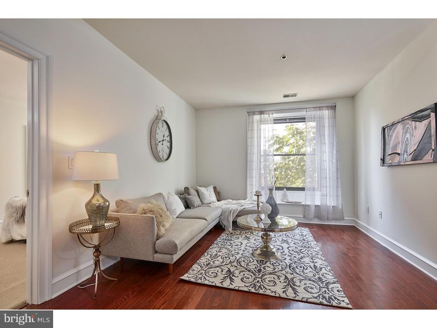 Stunning one bedroom, one bathroom residence in The Belgravia, a historic building designed by prominent architects Milligan and Webber in 1902. Located in the heart of Rittenhouse Square, the terra-cotta and limestone facade has been meticulously restored and commands your attention.  The grand and welcoming lobby features beautiful stained glass windows, a 24/7 staffed lobby, on-site property management and elevators.  Step inside the foyer and take in the style and elegance of rich hardwood flooring, oversized windows installed in 2016 and fine finishes.  Entertain in the spacious Living and dining room.  The open concept kitchen featuring granite countertops, stainless steel appliances and a breakfast bar make food prep and cooking a pleasure.  Recharge in the inviting bedroom surrounded by plush carpet, sun-filled windows and a double wall closet.  The spa-like full bathroom is surrounded by Carrera marble for the ultimate in luxury.  A convenient laundry closet completes this home.  Residents enjoy access to a fitness center plus one of the best locations in the city including world-class shopping along Chestnut and Walnut Streets, grocery stores, restaurants and a quick commute to U Penn, Drexel, and USP in University City. Enjoy everything Rittenhouse Square has to offer just steps from your front door! Rittenhouse Square Park just a block away, Schuylkill Banks running/jogging trails a short stroll from your doorstep.
