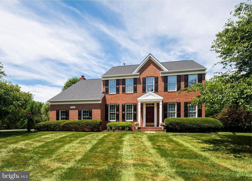 Welcome home to this beautiful brick-front colonial in highly sought-after Ashleigh Knolls. Nestled on a quiet non-through street featuring a private and picturesque 3/4-acre professionally landscaped level lot. 2-car side entry garage plus an expansive driveway offer ample parking for 10+ cars. The impressive interior features include a dramatic two-story foyer with an oak staircase, rich hardwood floors, and decorative crown/chair mouldings. The formal living room and dining room are inviting to your most festive gatherings. The private first floor study includes double doors from the foyer. Relax and unwind in the expansive light-filled family room, featuring a masonry gas fireplace that will surely warm your senses. The gourmet kitchen is equipped with 42" maple cabinets, a gas downdraft cooktop, double oven, granite counters, and a large island for entertaining. The first floor mudroom offers custom built-ins with designated spaces for storing coats, shoes and book bags.  The spacious primary bedroom suite is located on the upper level and showcases a cozy sitting area, a luxury bath, and 2 large walk-in-closets including one with stackable washer/dryer. Three additional spacious bedrooms and a full bath round out the upper level. The sprawling fully finished basement includes a huge recreation room, den, wet bar, full bath, Pergo floors, 2nd laundry, walk-up stairs to the rear yard, and ample storage space. Fabulous exterior features include an expansive deck, a huge backyard, an organic veggie garden, a shed, and plenty of room to entertain, lounge, play, and enjoy the panoramic vista views. Recent updates include new carpeting (2023), refinished hardwood floors (2023), new light fixtures (2022), interior & exterior fresh paint (2022), new sump pump (2022), upper-level HVAC (2021), water heater (2021), refrigerator (2019), repaved driveway (2018), and Roof (2011). Steps to community amenities including a 1-mile walking trail, and a sports court for tennis, pickleball and neighborhood parties/gatherings.