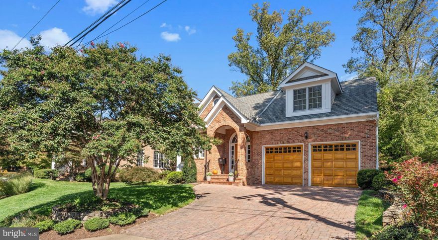 Plan to spend the holidays in this beautiful 5 bedroom, 6.5 bath home with approximately 4500 square feet of living space. It is located on one of the prettiest streets in the Bellevue Forest neighborhood of Arlington. Step into the grand, two-story foyer leading to the light-filled living room and dining room, perfect for all types of entertaining. Continue on to the gourmet kitchen, which features warm wooden cabinets, granite countertops, stainless steel appliances, an island and desk area, and eat-in dining space. The kitchen opens to a cozy family room with a wood-burning fireplace. French doors lead to an office/den beyond, with an attached full bath. This room could easily double as a main level bedroom or guest space. There is also a powder room on the main level for your guests’ convenience. Step out from the kitchen to a large patio, with plenty of space to grill and spend time entertaining outside. You may also enter the home from the oversized two-car garage, through the mudroom with a perfect spot to store your shoes, coats, backpacks, and more. 
There are attractive hardwood floors throughout the main level leading upstairs, where you will find the spacious primary bedroom with a 10ft tray ceiling, two walk-in closets, a private balcony, and a large bathroom with double vanities. Three more bedrooms on this level all have their own en-suite bathrooms. The laundry room is also conveniently located off the main hallway. Brand new carpet has been installed in all of the upper level bedrooms. 
Head down to the lower level, featuring a spacious rec room with newer luxury vinyl flooring and outside access. A full bath connects to both the rec room and a lovely airy fifth bedroom, perfectly private for your guests. You'll find a bonus room on this level as well, which is currently used as an exercise room, and could also be used as a media room or playroom. There are two large storage areas in the utility room and another storage room at the bottom of the stairs. 
The outside landscaping has been professionally designed and maintained. Natural wood garage doors add a special touch to the exterior. The home was designed and built by Spring Street Development and the sellers are the original owners. Updates include a newer humidifier on the lower-level furnace, an air scrubber on the upstairs heat pump, gas hot water heater, dishwasher, disposal, washer and dryer, sump pump with battery backup, the lower level flooring, as well as new carpet on the upper level and paint touch-ups throughout. 
This charming neighborhood is minutes to DC, Tysons Corner, Chain Bridge and Spout Run Parkway, convenient to area airports, shops and restaurants, as well as schools, parks, and a nature center. Enjoy walking and hiking just steps away in Donaldson Run Park, Potomac Overlook Regional Park, Zackary Taylor Park, and along the C&O Canal.  This part of N Quincy is not a through street – there is a cul-de-sac located at the bottom of the hill. You will love the peaceful location!