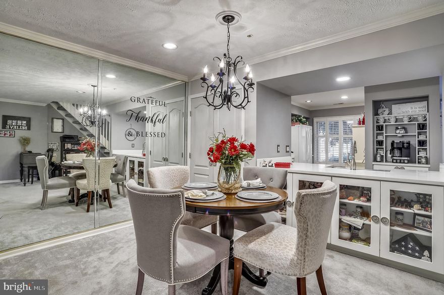 Updated and ready for a new owner!  This beautiful lake side home features waterfront views in the amenity rich community of Queen's Landing, with water access to the Chester River! This is one of the most desired floor plans with a fully enclosed three season room overlooking Lake Amiletto . Kitchen updates include new cabinets, appliances, stainless steel farm sink, quartz counter tops, a coffee bar and ceramic tiled flooring. The family room boasts a gas fireplace, recessed lighting, newer carpeting (covering solid hard wood flooring), all while providing water views.  The primary bathroom has been completely updated and features and entry farm door, custom tiled shower, custom vanity and ceramic tiled flooring. The second full bathroom and additional half bath have also received updates.  Custom wood shutters are featured throughout and convey.  All conveniently located within walking distance to local restaurants and the Cross Island Trail connecting Terrapin Park to The Narrows.