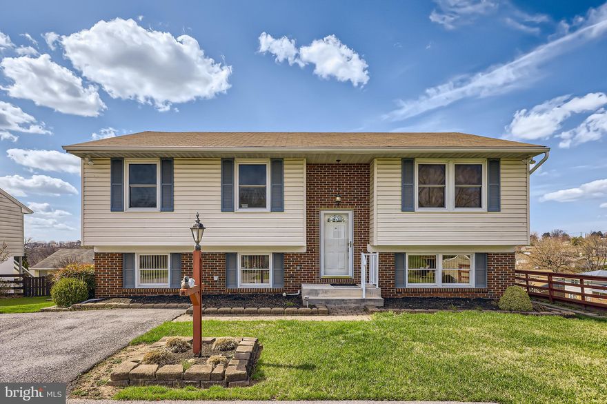 $20,000 Price Drop!! Wow! Beautifully remodeled home. This 3 bedroom. 2.5 Bath house sits at the end of a cul-de-sac. Home boasts a great layout, open and traditional floor plan, and is very attractive with great curb appeal. Located in a private end of road, elevated lot. Well thought-out layout has upper and lower-level living spaces making it perfect for entertaining guests or relaxing with friends and family. Enjoy the convenience of 2 private parking spots. Entering the home you have access to both upper and lower levels via a gorgeous set of hard wood stairs. The main level is an open and inviting atmosphere. The living room is perfect size for big, comfy furniture. The adjacent dining room is ready to host diner-parties. Rich hardwood flooring is throughout. The kitchen is stunning with its white shaker-style wood cabinetry and Carrara style quartz countertops and new stainless steel appliances. Off the dining area is your deck sitting ready for BBQs and morning coffee. This level also contains 2 large bedrooms and beautiful updated full baths. The master has its own en-suite bath and 2 large closets. The lower level is a sprawling family room big enough for movie nights and an exercise area. This is perfectly accentuated with a wood burning brick fireplace ready for cozying up to on a cold night. With ample natural light and a convenient powered room, the fully finished downstairs also features a large workroom/hobby room that could be easily converted to a fourth bedroom, with a backdoor entrance leading to your landscaped backyard. In addition to its current renovations, this property has been lovingly cared for and improved over the years, including a brand-new roof, new gutters and downspouts, new chimney, newer hot water tank, and updated easy-to-clean windows. This home is truly a rare find. Located in a quiet subdivision just minutes from grocery stores, shopping, and major highways, fall in love with this amazing property. Love it or leave it with our 12-month Buy It Back or Sell It for Free Guarantee*. If you have a home to sell, buy this home, and we will buy yours for cash. Don't miss out on this fantastic opportunity – contact us to schedule a tour today.