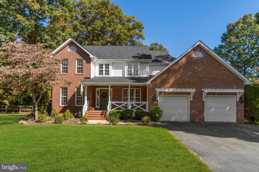 Gorgeous home in a beautiful established community surrounded by mature trees and a view of the neighborhood pond from your back deck. This brick front colonial is situated on 1.49-acre lot. This Four bedroom, 2.5 bath classic home is unique and not your cookie-cutter style colonial. Upon entering you are greeted by a two-story open foyer and hardwood floors throughout the main level. The main level includes an office/living room, dining room, family room, eat in kitchen, laundry room, powder room and more. Many upgrades just added in the kitchen such as quartz countertops, Island pendant lights, cabinet hardware, upgraded farmhouse style faucet and a beautiful large walk-in pantry! New roof added August 2022! 
 Enjoy relaxing in your family room with a wood-burning fireplace while looking out to your private fenced backyard facing the woods for peace and serenity. The community pond can be seen from your windows and deck adding to this serene view. This home features a dual staircase you can access from the two-story foyer or the kitchen area. Upstairs you have four spacious bedrooms two full bathrooms. The primary bedroom is very spacious and features a tray ceiling, large walk-in closet, and a very large size full bathroom. The primary bathroom has double vanity, soaking tub, and shower. Enjoy your backyard serenity with a view from your covered screened in deck or the uncovered deck space! You have easy access through the rear gate to the large community pond that you may enjoy fishing or relaxing by the water. Quick access for shopping and dining via Plank Road or access Central Park from River Road for additional shopping and dining! Don’t miss this opportunity to own a home with these features on a private 1.49-acre lot!