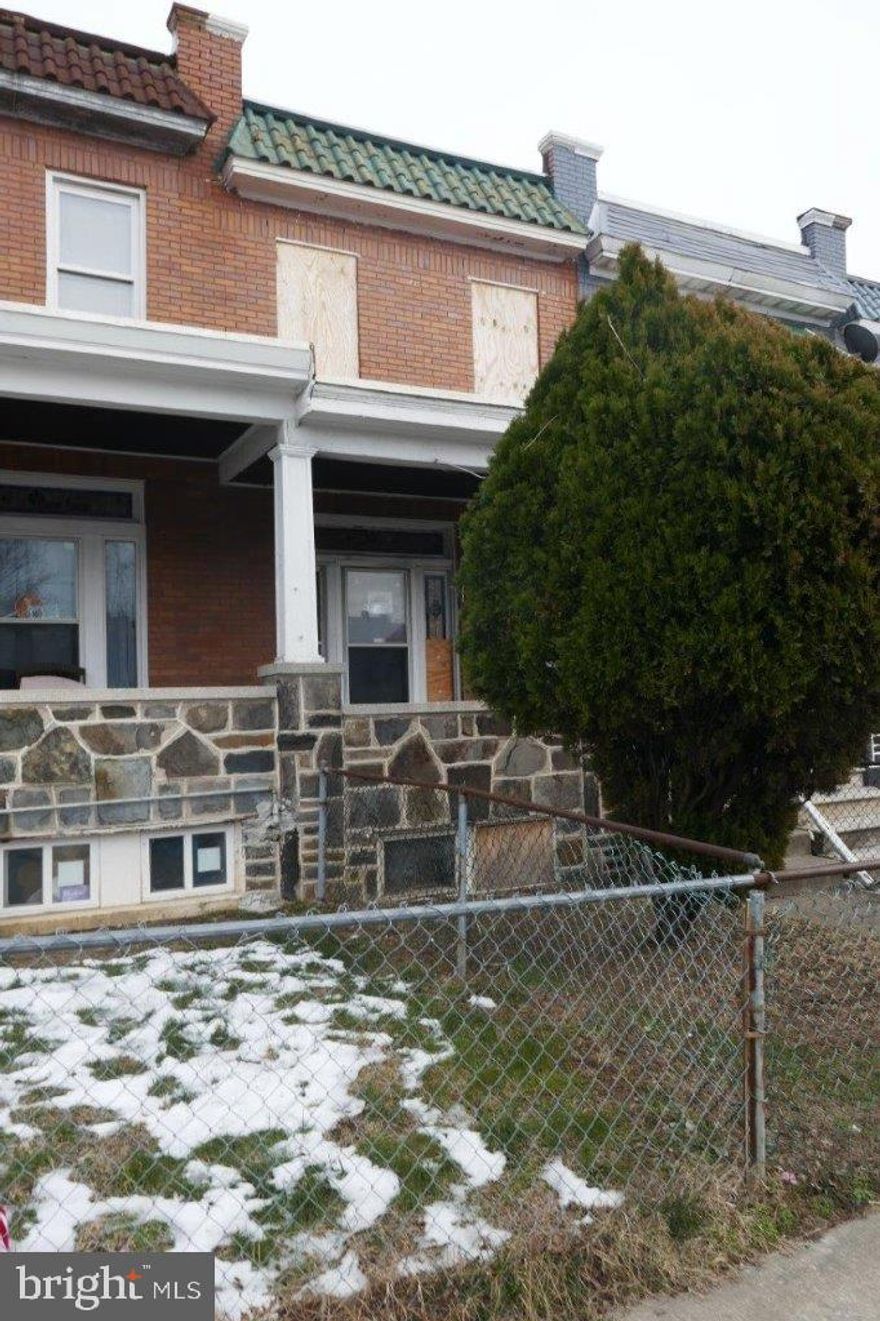 New Price Reduction! Discover a prime investment opportunity with this charming 1928 Colonial townhouse, ideally situated for renovation and resale or rental potential. Home is just minutes to John Hopkins Hospital, Inner Harbor, University Hospital, St. Agnes and I-95. Easy access to major traffic artery N Hilton St and W Baltimore St.
This interior row property boasts 1,186 finished square feet, featuring three bedrooms and a full bathroom, making it a versatile choice for investors looking to capitalize on the growing demand for updated residential spaces. The property presents a blank canvas for those with a vision to enhance its value. The full walkout basement offers additional space for expansion or creative use, while the brick construction ensures durability and classic appeal. Being located on Hilton St brings accessibility and a  key advantage for future tenants or buyers. Located in a neighborhood ripe for revitalization, this townhouse is positioned to benefit from increasing property values and community development. Seize this opportunity to invest in a property with significant upside potential. Whether you’re looking to flip or hold for rental income, this townhouse is a solid choice for savvy investors ready to make their mark in the real estate market. Don’t miss out on the chance to transform this property.