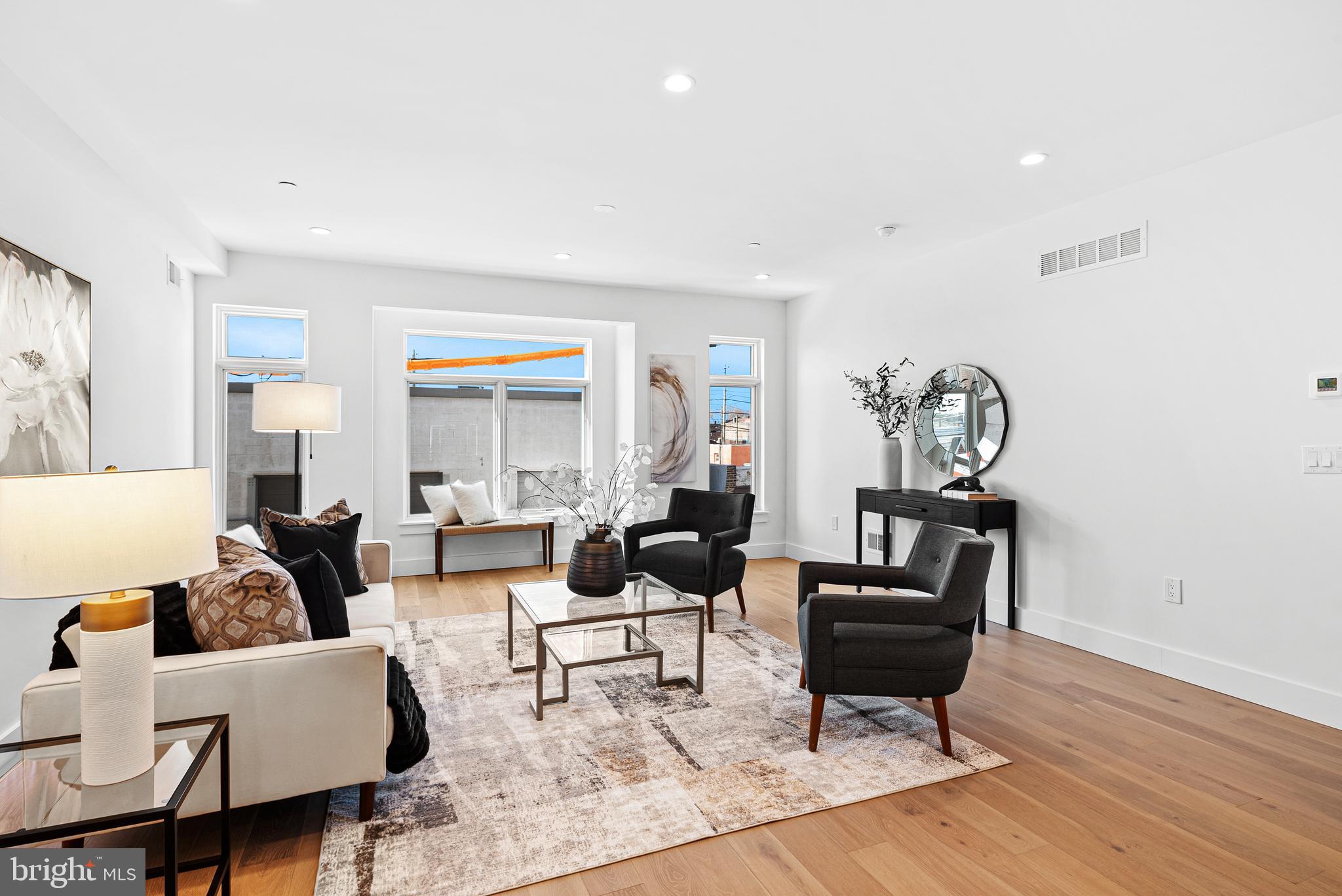 Introducing South Point, the epitome of contemporary urban living in the heart of South Philadelphia. These eight brand-new construction townhomes are the perfect blend of luxury, space, and convenience. Spanning three impressive stories and offering a spacious 3,000 square feet, these homes are designed to cater to your modern lifestyle. Each townhome boasts a finished lower level, providing you with that extra living space with 12-15' ceiling height and the convenience of garage parking, ensuring your vehicle is secure and easily accessible. However, the true gem of South Point lies above, where a sprawling roof deck awaits, offering an unparalleled panorama of Center City, the majestic Ben Franklin Bridge, and the iconic stadiums. Inside, you'll discover four spacious bedrooms and four-and-a-half luxurious baths, perfect for your family's needs. The open-concept design and modern amenities seamlessly blend style and functionality, creating a space that's perfect for entertaining and relaxing alike. But here's the exciting part: you have the opportunity to make these homes truly your own. Get in early to customize your finishing packages, ensuring your personal touch and style are reflected in every corner of your new home. Your investment in South Point is not only a testament to your modern lifestyle but also a smart financial choice. With a 1-year builder warranty to ensure peace of mind and a 10-year tax abatement, you'll enjoy significant savings as you make these townhomes your own. Be part of this neighborhood's exclusive new construction development, offering high-end living at remarkably affordable prices, and here's the bonus - no HOA fees to worry about. Inquire about the seller's rate buy-down option when you make a full-price offer! Don't miss this unique opportunity to call South Point home. Experience the best of South Philadelphia living with the convenience and style you've been dreaming of. Contact us today to schedule a visit and secure your future at South Point. Your modern urban oasis awaits!