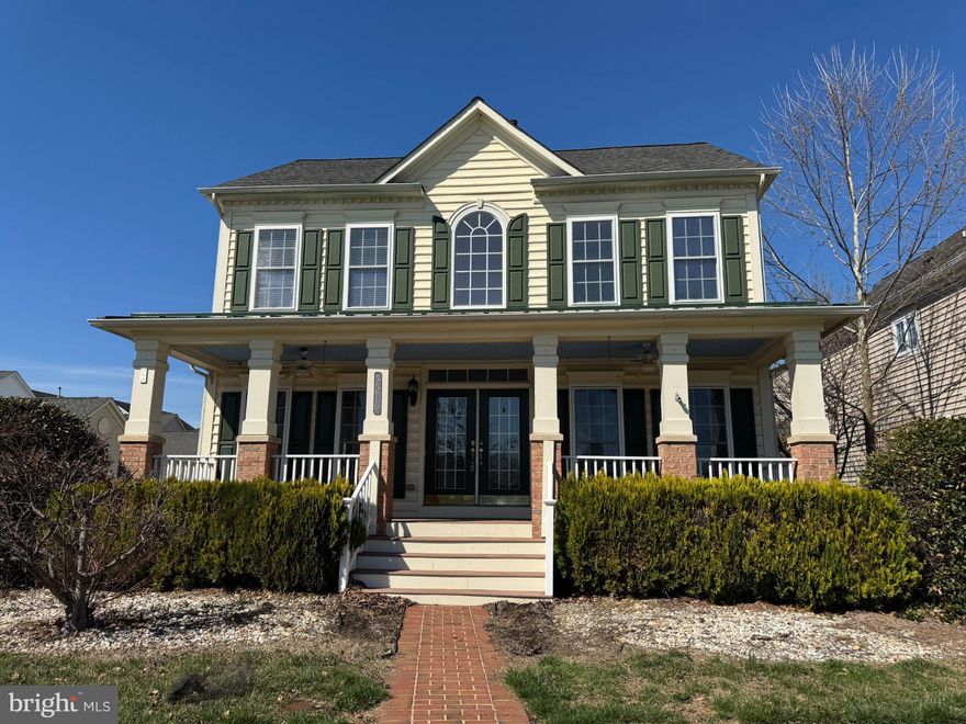 Check out this oversized single family home in Adamstown Commons! This home over looks the large green space so you have gorgeous views from your front porch. Fresh, neutral paint and hardwood floors throughout the main level. 2 story family room gives this home a spacious feel. Large office with french doors, separate living room and dining room. Large kitchen with granite countertops and upgraded cabinets opens up to your 2 story family room and breakfast room. 4 large bedrooms upstairs with 9 foot ceilings, and tons of natural light. 2 walk in closets in the master, large jacuzzi tub, separate shower, and water closet. Unfinished basement can be turned into storage or whatever you'd like! 2 car detached garage features a bonus room with full bathroom above the garage. Yard is completely fenced in and mostly pavers for low maintenance. Additional sitting porch off the side. This home has it all!