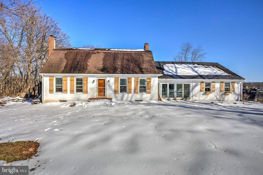 Exceptional opportunity to own 15 acres of countryside, with approximately 13 acres currently in agricultural use. This four-bedroom, three-and-a-half-bath home offers a generous footprint and a solid structure—ready for your updates, customization, and vision. While the property needs some TLC, it presents outstanding potential for renovation, investment, or creating your ideal rural retreat.

The land is well-suited for agricultural or equestrian pursuits, featuring a feed barn, full stall stable, silo, and run-in shed—providing excellent existing infrastructure for livestock, equipment storage, or hobby farming.

Notable updates include a whole-house water softener and UV system installed in 2024. In 2021, the main living area was opened up, the primary bathroom was remodeled, hardwood floors were sanded and stained, and updated light fixtures were added in several areas. A second 200-amp electrical panel services the feed barn and silo, adding valuable capacity and flexibility for farm operations. A second well was dug and is available for use if needed. Propane tank is owned and operates generator. Starlink equipment conveys with the purchase as well!

Seller will not be responsible for rollback taxes. Property is being sold strictly as-is.