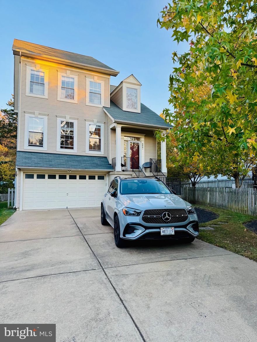 A stunning single-family residence, adjacent to trees, boasts an abundance of natural light and an open-concept layout. The expansive front driveway, oversized deck, and sizable backyard render this home truly unique. The upgraded kitchen features granite and marble countertops, an oversized center island with stainless steel appliances, and custom cabinets with pull-out shelving and soft-close doors. The main level, replete with hardwood flooring, comprises a powder room, formal living and dining areas, an office, and an expansive kitchen and family room. The deck, accessible from the kitchen, leads to a distinctive and oversized deck area, ideal for barbecues or gatherings. The upper level boasts new luxury vinyl plank (LVP) flooring, a laundry room, a primary bedroom with a walk-in closet and a recently renovated bathroom with his-and-her vanity and oversized shower. Two additional generously sized bedrooms and a hallway bathroom are also located on this level. The basement is fully finished, housing a large recreation room and full bathroom. The home is enclosed by a fenced backyard, offering privacy as it adjoins trees. The location is favorable, situated near Gainesville, Bristow, and major routes such as 234 and 66, as well as the Jiffy Lube center. The property is zoned for Gainesville schools due to its proximity to the city. Submit your application today!