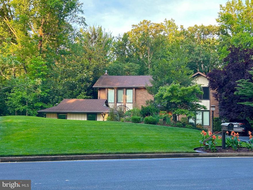 A contemporary home is situated in a quiet and peaceful Mantua community. This beautiful, well-cared home with over 1/3 acres of the premium lot back to wood and parkland offers you the best of privacy.   Enjoy your vacation right at home. You are surrounded not only by nature but also the convenience, just minutes from Route 50, I495, a short distance to Mosaic District, Metro stations... The Gerry Connolly Cross Country Trail runs through the community. The house is located in the Woodson High  School pyramid.  300K was spent on updates modernizing the exterior and interior.  The 2 levels of the sunroom with a beautifully designed spiral staircase add 360 square feet of living space to the house.