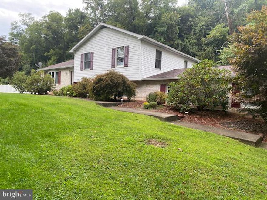 4 bedroom, 2 full bath Split level home in Fermanagh Twp situated on 1.84 country acres!  3 bedrooms & 2 full baths up & 1 bedroom, laundry & sitting room down THEN  down again to the family room with propane stove!  3 finished levels of living!  Fenced 18x24 inground pool 4' to 9'.   Storage shed.  Fenced rear yard.   New roof 2023.   Artesian Well & onsite sandmound.  Baseboard electric and 2 mini splits!  200 & 100 AMP electric service.  Central vac!  New front door ensemble & new dining room window.  Both have transferrable warranties.   Covered rear porch to sit and watch wildlife!