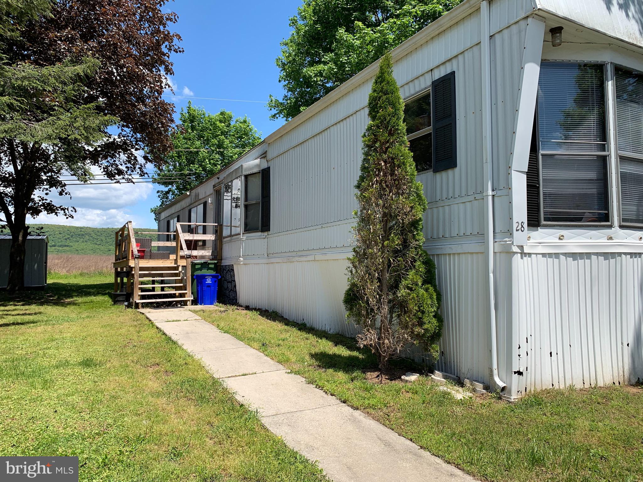 Very nicely maintained 1981, 14x70, singlewide with 2 bathrooms and 2 bedrooms located in Silver Springs County Estates. The oil furnace and oil tank were replaced in 2016 and in 2018 the second bathroom was redone including new subfloor, tile and new vanity sink and medicine cabinet. There is a newer 8x12 deck, gutter guards installed, roof was resealed, new central 18000 btu air conditioner, Subfloor sections have been replaced, new carpet in living room, just painted in the living room and hallway. There are also new light fixtures in kitchen, remote ceiling fan and the primary bath has a jacuzzi tub with a rain shower head from the ceiling. The property has been very well taken care of but is ready for a new owner!!!. All applicants must be parked approved, dogs are allowed for a fee and under 30 pounds with breed restrictions. Lot rent is $431.00 monthly.
