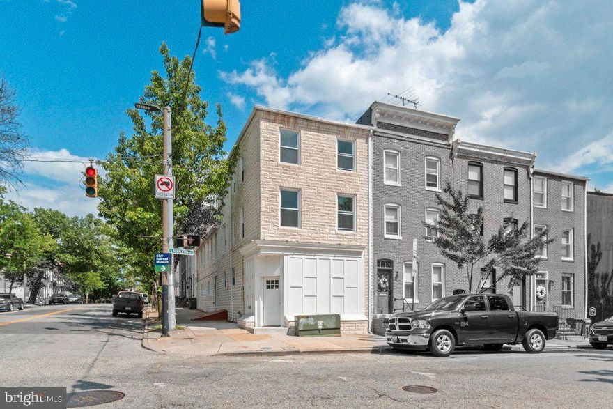 ● 2024 full-gut renovation: Live in one beautifully updated apartment with stainless steel appliances, granite counters, and real wood cabinetry—while generating rental income from the second unit.
● Just 0.5 miles to the University of Maryland—serving grad students and professionals seeking nearby housing.
● Hollins Market revitalization and BioPark expansion fuel long-term neighborhood growth and demand.
● Potential for Lead-Free Limited  or Lead-Free certification, reducing turnover costs, liability, and compliance paperwork for ownership.
Apartment Interiors:
Fresh from a 2024 renovation, 101 South Poppleton offers the perfect setup for a buyer seeking charm, convenience, and a smart path to homeownership. Live in one apartment and lease the other for supplemental rental income, all while building equity in a growing Baltimore neighborhood.

Inside, both apartments showcase thoughtful updates with quality materials: upgraded stainless steel appliances—including French door, bottom-freezer refrigerators—are paired with granite countertops and real wood cabinetry for a polished, high-end finish. Bathrooms are bright and refreshed, featuring modern vanities, easy-to-clean ceramic tile flooring, and fiberglass shower inserts in most units.  Durable flooring, stylish fixtures, and in-unit laundry round out the turnkey living experience.

Utilities:
Utility systems were fully updated during the 2024 renovation, supporting low-maintenance ownership and tenant comfort. New “gas fill” vinyl replacement windows improve energy efficiency by reducing heat transfer. Apartment 1 is equipped with dual-zone heating: one gas furnace and one heat pump, both paired with central air conditioning. Apartment 2 is served by its own gas furnace with central air. Both units share a single gas meter, while electric service is separately metered for tenant billing. Tankless electric water heaters provide on-demand hot water with quick recovery. All interior supply and drain lines were replaced during the renovation. As a full gut rehab, the property may qualify for Lead-Free Limited or Lead-Free certification—reducing liability, compliance paperwork, and turnover costs for ownership.

What’s Special About Hollins Market?
For buyers looking to put down roots in Baltimore, Hollins Market offers the charm of a historic neighborhood with the momentum of major redevelopment. The $2.1 million revitalization of Baltimore’s oldest public market has transformed it into a lively hub for fresh food, local vendors, and community gathering—strengthening the neighborhood’s appeal for residents and small businesses alike.

Just a half-mile walk away, the University of Maryland campus anchors the area with its nationally ranked programs in law, dentistry, medicine, nursing, pharmacy, and social work. Unlike traditional colleges, the University does not offer on-campus housing, creating consistent demand from graduate students and professionals seeking quality rental options nearby. Adjacent to campus, the expanding BioPark is establishing Hollins Market as a growing hub for life sciences and innovation. The newly constructed 4MLK facility adds 250,000 square feet of modern lab and office space, bringing over 1,000 biotech professionals to the neighborhood and further fueling demand for well-located housing within walking distance.

With continued investment, an active community, and a walkable urban lifestyle, Hollins Market is an ideal location for buyers seeking long-term value and connection.