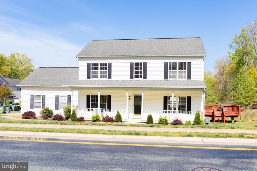 TAKE A DEEP BREATH  AS YOU TAKE THE LAST TURN OFF OF ROUTE 1 INTO THIS  BEAUTIFUL GATED COMMUNITY IN THE MOST SORT AFTER WIDEWATER VILLAGE, LOCATED MINUTES FROM QUANTICO MARINE CORPS BASE. 5 BEDROOM,3 1/2 BATH, SOAKING TUB, WALK OUT BASEMENT WITH THREE YEARS OLD HARD WOOD FLOOR  WITH NICE BAR, NEW CARPET, FRESH PAINT ON ALL LEVELS, DORIAN COUNTER TOPS,9' CEILINGS MAIN LEVEL, CROWN MOULDINGS, CHAIR RAIL MOULDINGS, REAL HARD WOOD ON TWO LEVELS, BERBER CARPET, STONE FIREPLACE, CUSTOM PAINT,POSSIBLE 6TH BEDROOM/OFFICE IN BASEMENT, LAWN SPRINKLER SYSTEM,ONLY HOME OF THIS STYLE IN WIDEWATER VILLAGE,SIDE LOAD GARAGE,DECK,WET BAR,WALK IN CLOSETS.