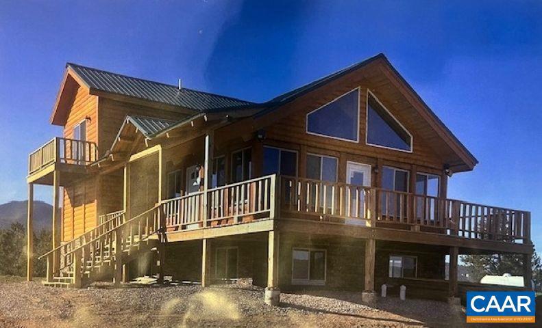 Current owner has a home at Wintergreen and had intended to build on this site. He has identified a wonderfully built cabin that could be built on this site which is on a small cul de sac between two very attractive homes. Plans and building estimates are in the docs section of the listing description. The best house location has already been flagged. Please note: the lot is being sold as vacant land only. The home shown in the plan is not built and not included in the sale price. The proposed plan is for informational purposes and to help envision one potential layout for the property.