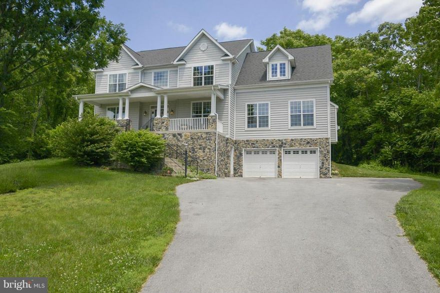 REDUCED! Wake up to the sun rising over stunning views of Myersville. Enjoy the evening sunsets on the valleyfrom the front porch! Almost 4,000 sq ft of fin. space. Hard wood floors, 2 str Foyer, gourmet kit. w/ granite, stainless appliances, dbl oven, dn dft cook top. Huge f/m w, f/p. Mstr ste has jetted corner tub and sitting rm.  Search address on You Tube for video. Bank Reviewed Price!