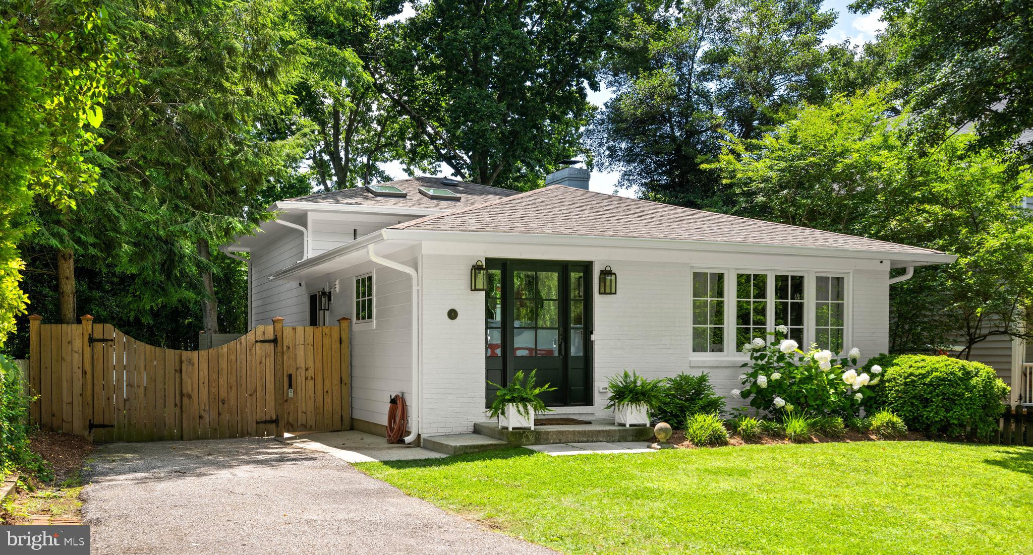 Welcome to 8 Lawrence Avenue, a stunningly renovated 4 bedroom, 3 bathroom home nestled in the coveted waterfront community of Bay Ridge in Annapolis, Maryland. This beautifully updated residence blends timeless charm with modern details. Inside, you'll find wide-plank white pine floors, a fully updated kitchen featuring sleek stainless steel appliances—including a brand-new refrigerator—and exquisite Carrara marble countertops. The open-concept main level is bathed in natural light, complemented by a refreshed sunroom featuring a new roof and skylights, which create a bright and inviting atmosphere throughout the home.
The bathrooms are equally refined, offering spa-like amenities including a curbless walk-in shower and rain showerhead. A new HVAC system and hot water heater ensure year-round comfort, while the roof has been insulated with open-cell spray foam for energy efficiency. Outdoor living is just as impressive, with a stone patio perfect for entertaining, an outdoor shower for beach days, and a lush, irrigated lawn surrounded by mature landscaping. Two storage sheds offer practical convenience without compromising the aesthetic of the property.
Located just steps from the Chesapeake Bay, this home is part of the vibrant Bay Ridge community, which offers residents private beaches, a marina, a pool, and year-round events that bring neighbors together. Whether you're entertaining guests or enjoying a quiet sunset by the water, 8 Lawrence Avenue offers a rare opportunity to enjoy luxury, comfort, and community all in one place.