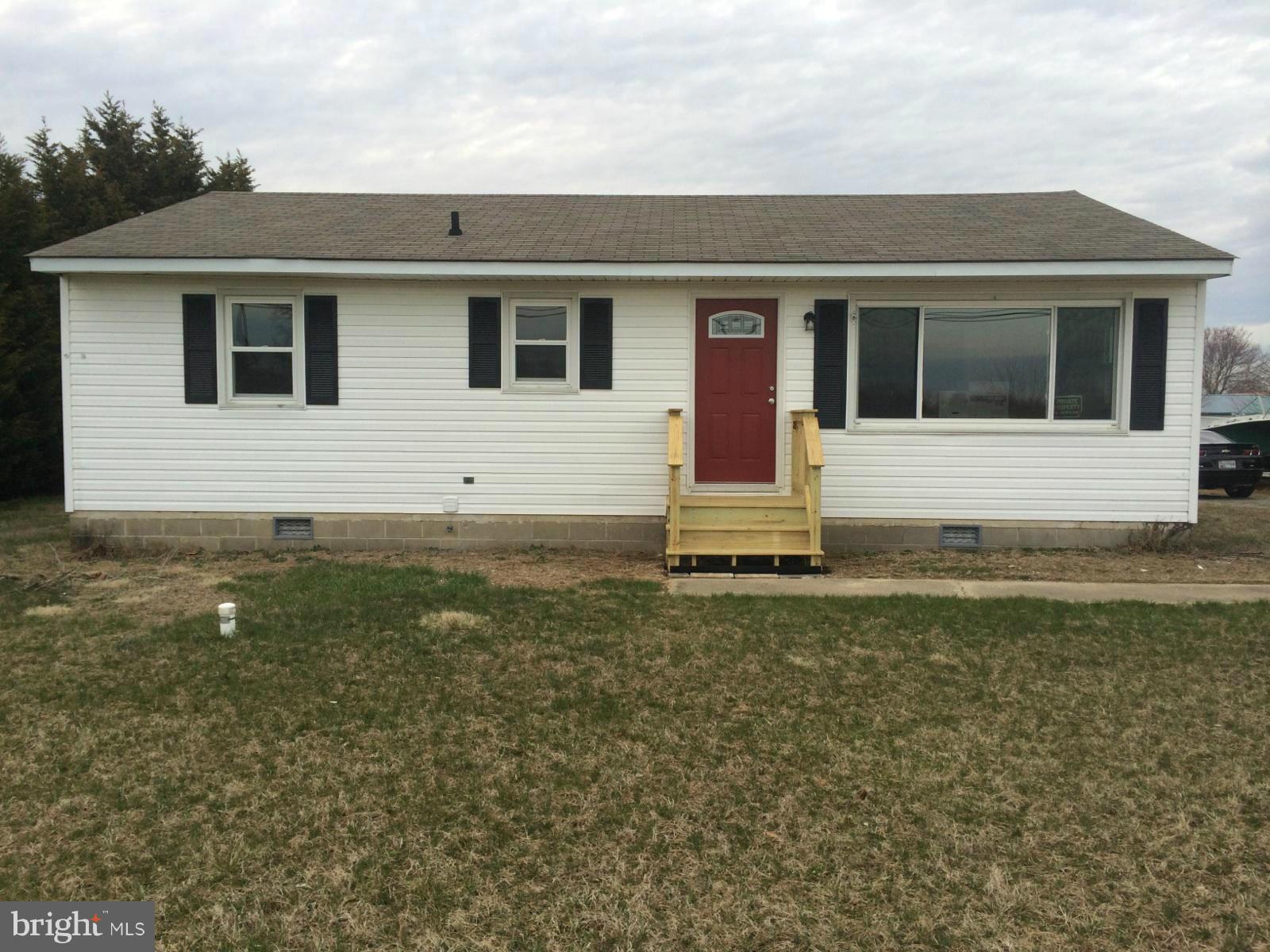 Completely renovated rancher on 1/2 acre overlooking farmland, 3 bedrooms, 1 bath, spacious living room, kitchen w/ SS appliances, hardwood and ceramic tile flooring throughout, deck off back, new hot water heater and water softener....landscaping to be completed by the end of April.....MUST SEE!!!!