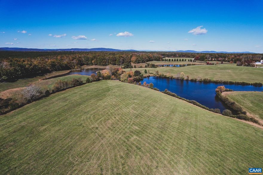 Great opportunity to build on a mountain view lot on nearly 25 acres just outside of Charlottesville, Virginia. This lot is flat to gently rolling, with multiple build sites that boast mountain views, as well as frontage along a large, 4.5 acre pond. This lot has been perked for a conventional drain field with a recent survey recorded. Road frontage along Briery Creek Rd. Build your dream home overlooking the mountains with a peaceful pond to enjoy as well. Underground electricity available with CVEC, and high speed fiber optic internet available through Firefly.   This is Lot #15 within Oakwater Estates, a new development with high acreage lots in both Fluvanna and Albemarle County. There is no HOA, and bringing your own builder is welcome and expected.   Minutes from renown wineries and approximately 25 minutes from downtown Charlottesville.      The Timbers Group has direct ownership interest in Oakwater Estates. This ownership disclosure is made and pursuant to Virginia Law section 54.1-2138.2.,Lot 15 Oakwater Estates