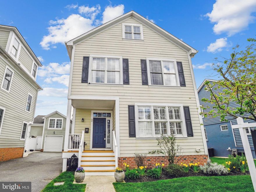 Welcome to Murray Hill and Annapolis living at it’s finest! 4B Constitution Ave presents the perfect combination of city center location and smart modern features. Built in 2008 and beautifully upgraded, this generously sized home boasts about 3700 square feet across 4 levels, 4 bedrooms, 4.5 bathrooms, plus office, loft, and full basement. Additionally featuring a unique detached garage with workshop/storage on main level and studio apartment with full kitchen and bathroom on the upper level, the investment/rental opportunities are limitless. Upon entering, you will find updated luxury vinyl wide plank flooring and open concept living with the living room and sitting room (could be additional dining room!) leading to the heart of the home. The bright, natural light-filled kitchen (renovated in 2019) features a reimagined layout, upgraded quartz countertop and backsplash, stainless steel appliances, custom island with seating, storage, and beverage fridge, and space for a large dining table. Perfect for cooking and entertaining, the kitchen leads out to the back deck and fully fenced pet-grade turf yard. 

Upstairs, the 2nd level features 2 bedrooms and a full bathroom plus an amazing primary suite. The primary en-suite bathroom was fully renovated in 2019 with no detail spared: Kohler fixtures including DTV Smart Technology shower control system with Real Rain head, 2 shower heads, hand wand, 4 body sprays; curbless entry shower; radiant heated custom tile floors; heated towel bar; dual sink vanity; mounted Frame TV (conveys); linen closet; and upgraded privacy window. Enjoy the massive walk-in closet with custom built-in shelving system. The 3rd level features a loft area, perfect for a home gym or bar and has access to the rooftop deck, with sun awning and stunning views of the neighborhood. Also on the 3rd level, you will find a large bedroom with a walk-in closet and full bathroom, perfect for guests; and separate office and laundry room. The lower level basement has a wonderful layout with large rec room, a bar area with fridge and live edge wood bartop, an additional office/den, and full bathroom, plus utility room with extra storage. 

Too many upgrades to list (please see attached document) throughout including: Custom Plantation Shutters (living room and back door); Custom Roman Shades (kitchen and living room); Upgraded Lutron lighting throughout (Homeworks QSX; app controlled); 400 Amp Electrical panel to allow for EV charger; Ceiling speakers in kitchen, family room, master bath, studio apartment, roof deck; HVAC/Furnace updated in 2022 (both zones); Nest smoke detectors; and Approved drawings/plans for screened in porch (can convey). Off-street parking for 3 cars in your driveway! Right out your front door, the best of Annapolis awaits: launch your SUP at Amos Garrett Waterfront Park (3 blocks away); stroll to downtown Annapolis restaurants, coffee, and shopping; Maryland Hall featuring shows and exhibits; games and events at the Navy Stadium; and enjoy City Dock and the Naval Academy. Don’t forget easy access to local favorite Annapolis events including the beloved St. Patrick’s Day and Fourth of July Parades! Welcome Home!