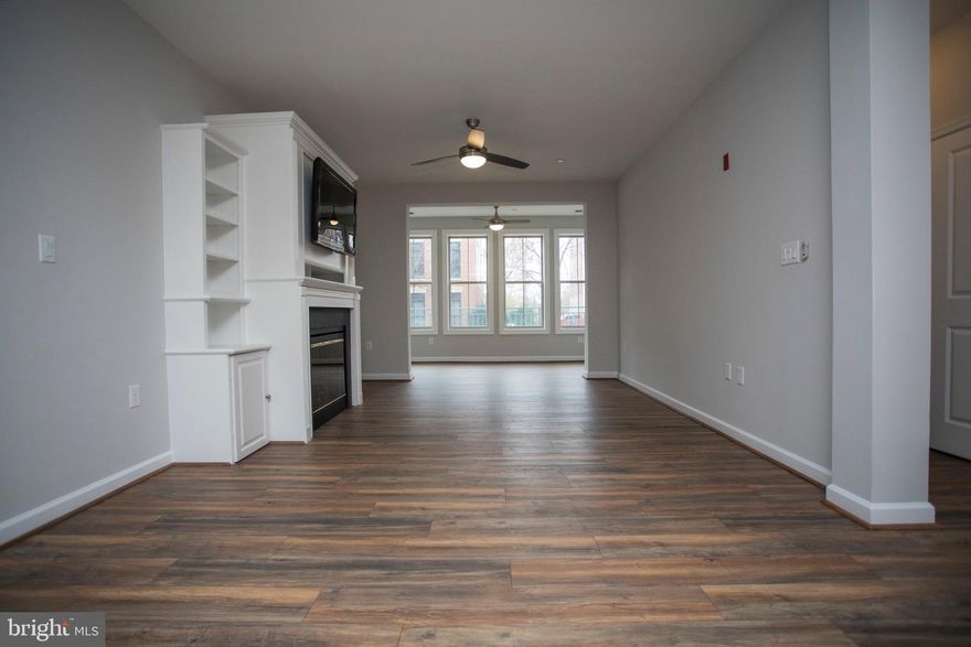 HUGE PRICE REDUCTION!!!!  Come see this newly renovated unit in the lovely Belmont Bay community located on the Occoquan River.   This beauty boasts new everything - kitchen, granite, bathrooms, flooring, paint, appliances, countertops, lighting, bathrooms.  On top of being newly renovated, the community offers so much convenience with the  VRE/Amtrak train station in the development for commuting in and out of Northern Virginia and Washington D.C. It also offers a community pool and boat marina, where you can dock your boat at your slip and walk 300 feet to your front door step. Come and check it out!