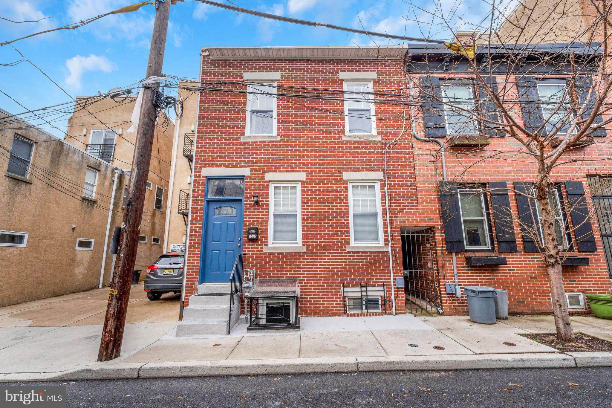 This Graduate Hospital beauty is located on a quiet block in one of Philly's most coveted neighborhoods. A quick walk to shopping destinations like Sprouts, Target, and the South Street corridor. Hop on the Broad St Line or a bus and you're a few stops away from City Hall or Rittenhouse Sq. This beautiful home features gleaming hardwood floors throughout, a sleek modern kitchen with stainless steel appliances and quartz countertops, recessed lighting, and central air. The warm and inviting open concept main floor also features decorative shelving, a full bathroom with laundry hookups, bonus pantry closet, and a cozy brick-paved patio. The fully finished basement may serve as a family room, office, or third bedroom with large window well egress leading to the front exterior and providing ample light. The second floor has two equally comfortable, sun-filled bedrooms with adequate closets and high ceilings. Two modern full bathrooms (one hall and one en suite) offer the luxury of convenience for multiple residents. This move-in ready home is a must see in a fantastic location! Schedule your appointment today.