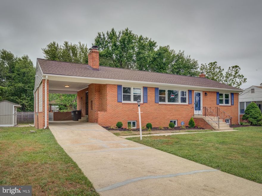 Beautiful, Spacious 2 level 4 bed & 3 bath. Renovated, Wood floors, fresh paint, 42" cabinets with Granite tops, stainless steel appliances, Main level and stairs Hardwood floor & New HVAC, water heater, upgraded lights. Level yard.