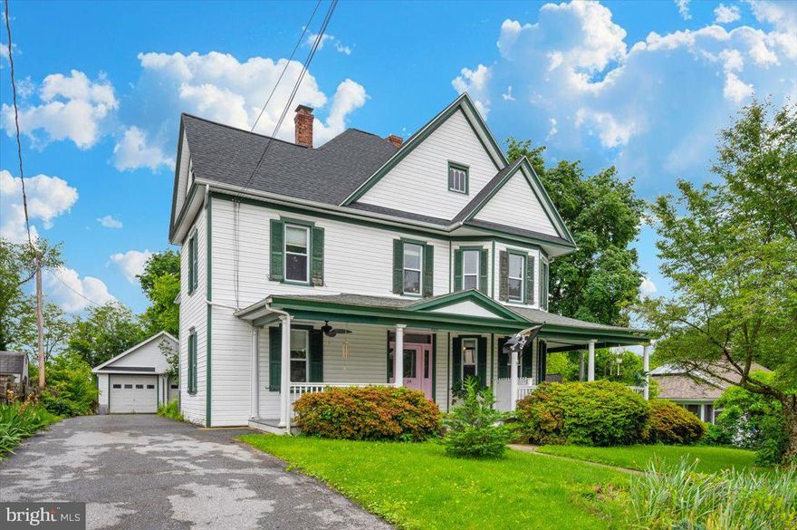 Big, beautiful  Victorian home with bedrooms and baths on both levels! In the county town of Thurmont, nestled in the Catoctin Mountains.  Pulling into the drive, you will see a beautiful Cherry tree and large wrap-around porch.  It is a perfect spot for front-porch sitting!  The front door leads to a center hall and impressive stairway.  The traditional layout on the main level features a large living room, large dining room, and updated kitchen.  Off the hall is a bedroom (great for home office) and full bath (and laundry).  Tucked behind the kitchen is another full bath, bedroom (with private exterior entrance!), and mud room leading to the rear yard.  The basement is accessed off the corner of the kitchen.  Upstairs are five additional bedrooms and a third full bath.  Note the wood floors and mouldings throughout.  The rear yard is fenced.  It also has a patio, pergola, perennial plantings, and even a vegetable garden bed.  The 3+ car garage is detached.  This home offers lots of space, inside and out!  Thurmont offers small-town charm with restaurants, parks, schools, and other amenities.  Close access to major roadways too!