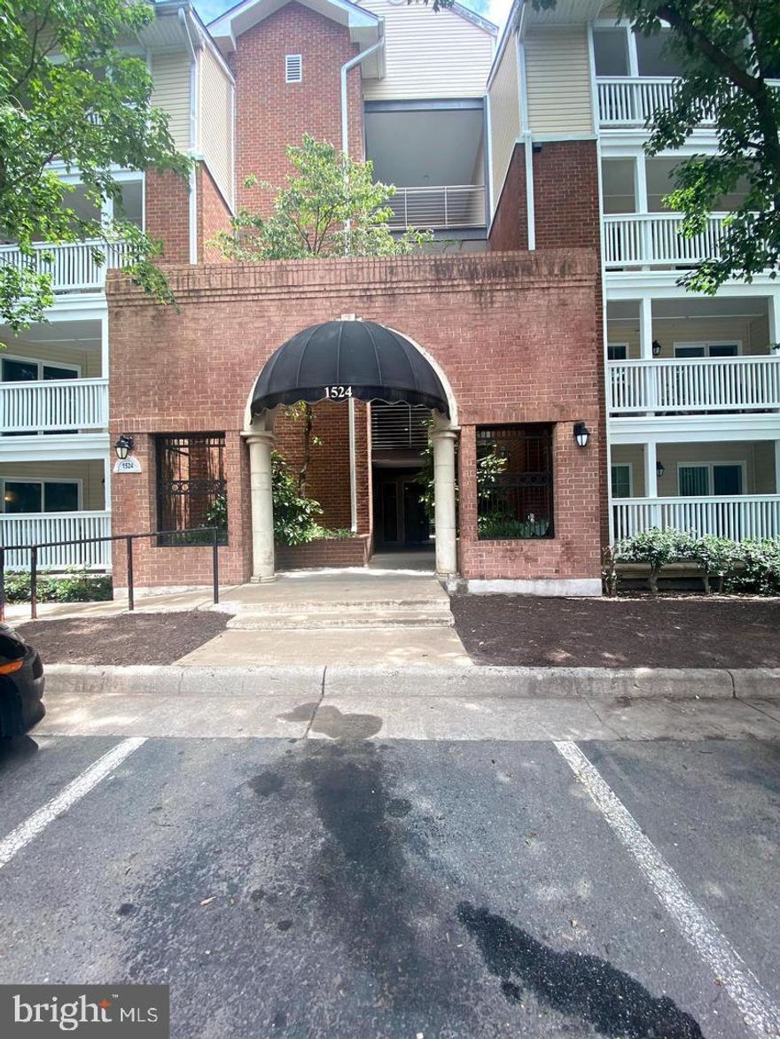 Live in the heart of Tysons Corner in this beautifully updated top-floor condo featuring brand-new flooring throughout and abundant natural light. Enjoy a spacious layout with a cozy fireplace, a large private balcony, and plenty of storage—including a walk-in closet, two additional closets, a laundry area with full-size washer and dryer, and an outdoor storage closet. Stay connected with a fully wired setup and smart thermostat. Reserved garage parking included. Just a short walk to Tysons shops, dining, and the movie theater—location and comfort all in one!