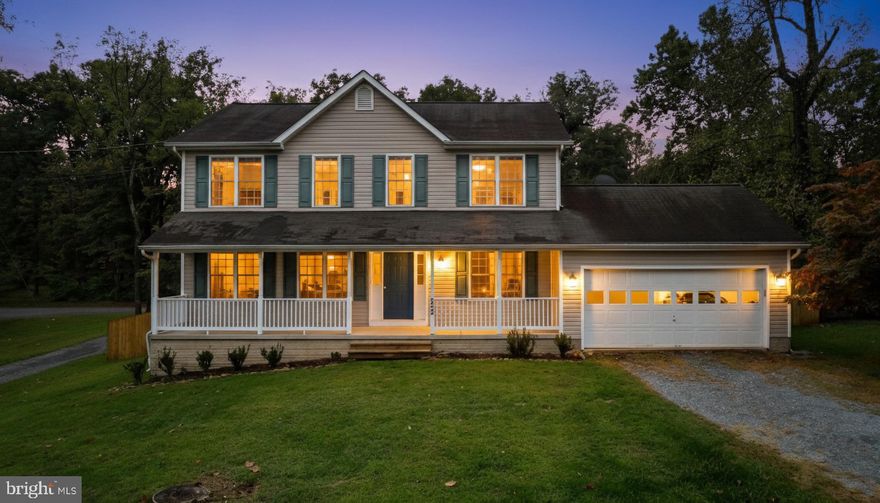 Welcome home to this turn key 4 Bedroom, 3.5 bathroom home w/ a covered from covered front porch and  fenced in lot! Main level offers a Foyer w/ coat closet, a spacious living room, private dining room off the large kitchen (with new SS Appliances and 2 Pantry Closets), inviting family room with cozy wood stove and access to covered back deck + yard, as well as a guest bathroom. Upper Level features a Primary Suite w/ ceiling fan, walk in closet, private bathroom w/ double sinks, soaking tub and walk in shower. There are 3 additional bedrooms with a full bathroom. The basement of this home offers a large space for hanging out or over flow space for guest with a full bathroom and laundry.  Ample amount of storage, plus 12x16 storage shed in back + paver patio, High Speed Internet, All paved roads to home, NO HOA. Minutes to the Lake Shannondale (55 acre lake - see pictures), amenities, VA / MD Line for travels, 2 Car Garage.  New LVP Flooring though main and upper level, 4 Bedroom Septic, Newer Paint, SS Appliances and more!